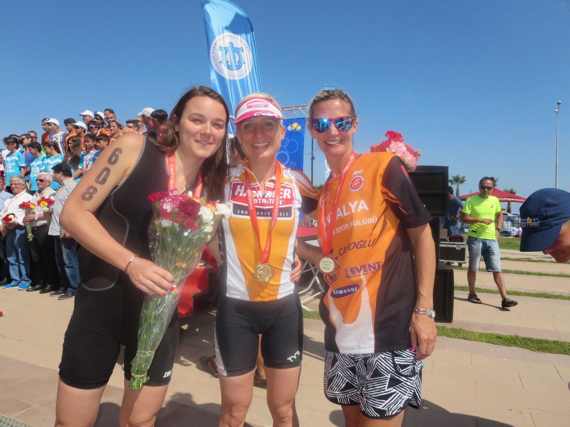 Tech. Sgt. Jessica Pigott, 717th Air Base Squadron logistics contracting manager, (middle) poses for a group photo with the women’s second and third place winners after the Antalya Olympic Distance Triathlon May 3-4, Antalya, Turkey. Pigott won first place in the women’s category completing the race in 2:38:57. (Courtesy photo)