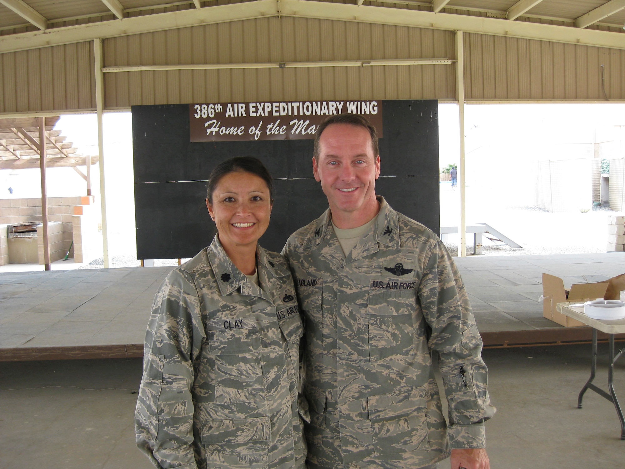 Col. Brad Hoagland and Lt. Col. Elizabeth Clay pose for a photo at the 386th Air Expeditionary Wing, Southwest Asia. Both Clay and Hoagland are from the same hometown in Elyria, Ohio and are currently serving together at the 386th Air Expeditionary Wing. (courtesy photo)