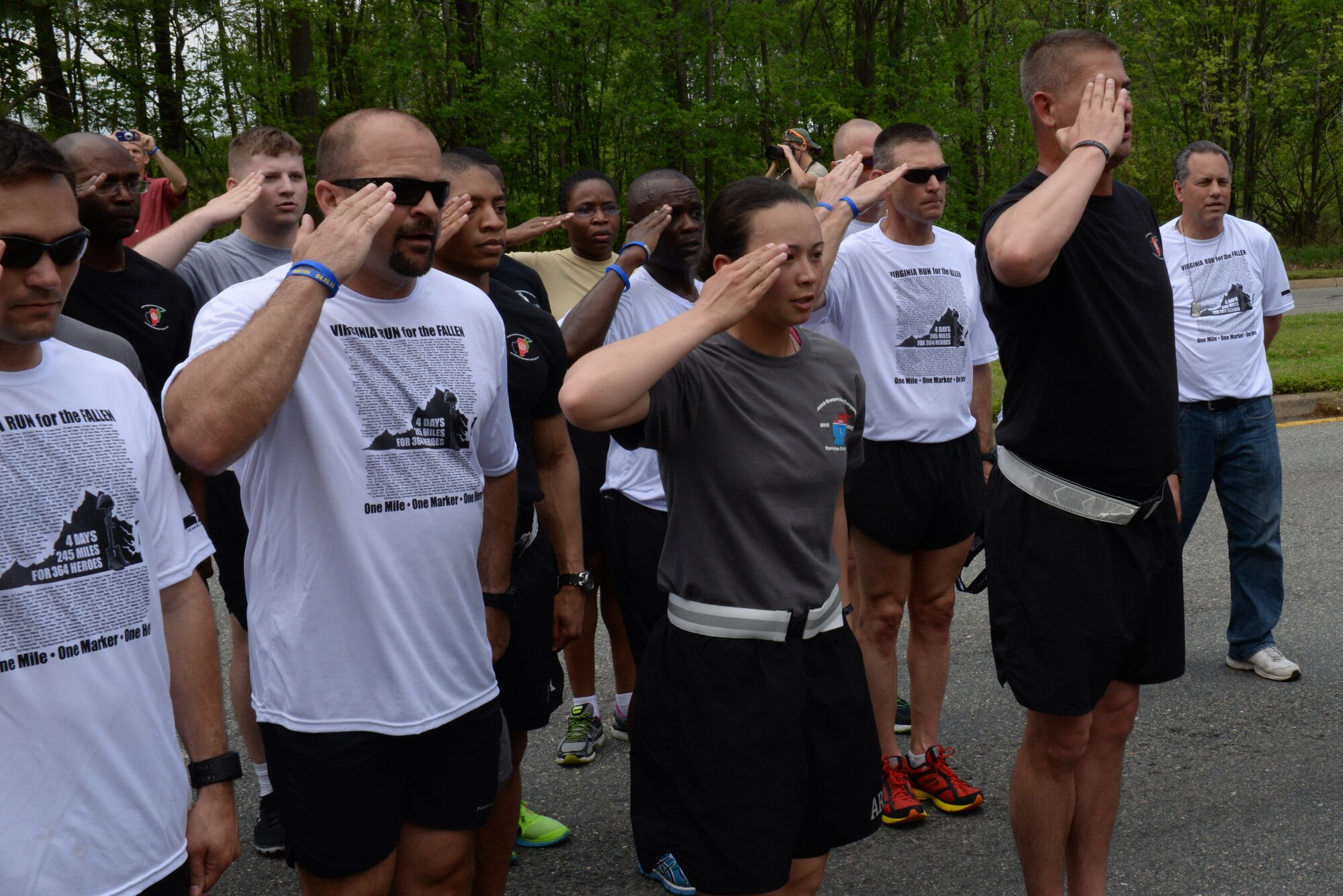 U.S. Army Soldiers from the 359th Inland Cargo Transfer Company, 10th Transportation Battalion, 7th Transportation Brigade (Expeditionary) render a salute to honor fallen U.S. Service members during the Second Annual Run for the Fallen event in Hampton, Va., May 1, 2014. More than 70 U.S. Army Soldiers from the 10th Trans. Btn., 7th Trans. Bde. (Ex.), joined Hampton Roads community members on a three-mile stretch during the second annual “Run for the Fallen. (U.S. Air Force photo by Senior Airman Teresa J.C. Aber/Released)