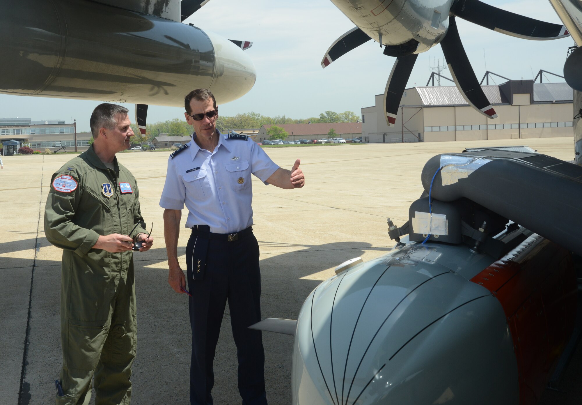 Lt. Gen. Stanley E. Clarke III, director of the Air National Guard, and Col. Michael P. Steindl, 109th Operations Group commander, inspect the U.S. Antarctic Program's new Icepod at Joint Base Andrews, Md., May 8, 2014. The pod will allow the Guard to collect research data while it conducts supply and transportation flights throughout Antarctica. (U.S. Air National Guard photo by Senior Airman John Hillier/Released)