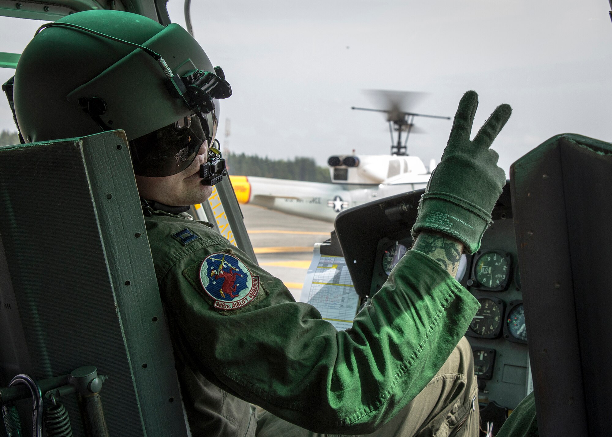 Capt. Jonathan Gentri, 459th Airlift Squadron pilot, counts down before take-off at Yokota Air Base, Japan, May 8, 2014. Yokota Airmen regularly perform practice missions to be prepared to respond to any contingency.  (U.S Air Force photo by 2nd Lt. Ashley Wright/Released)