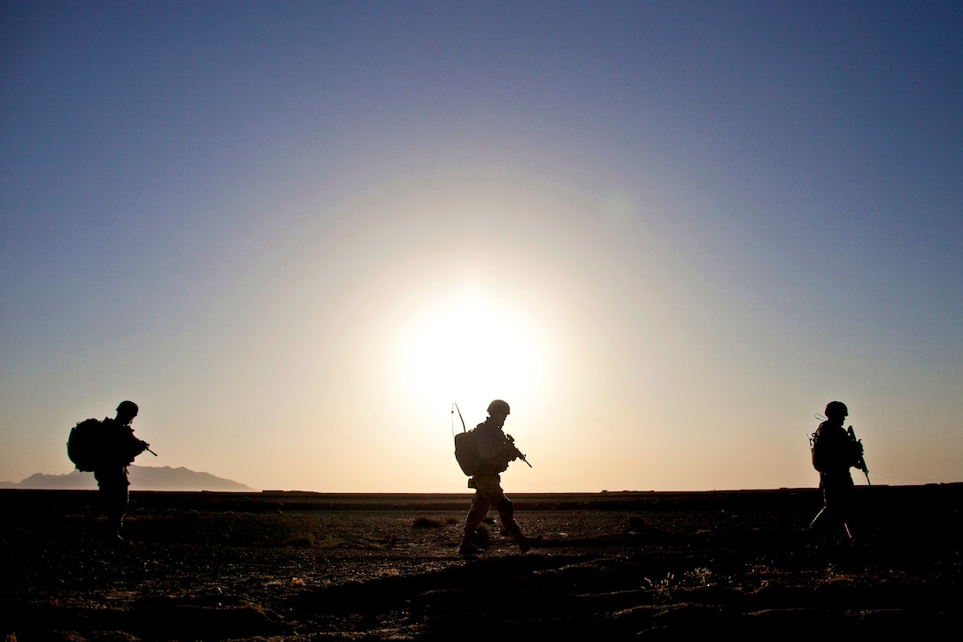 Georgian soldiers patrol during Operation Northern Lion II in Afghanistan's Helmand province, July 3, 2013. The Georgian soldiers led the operation, which included U.S. Marines and sailors, to deter insurgents, establish a presence and gather human intelligence in the area.  
