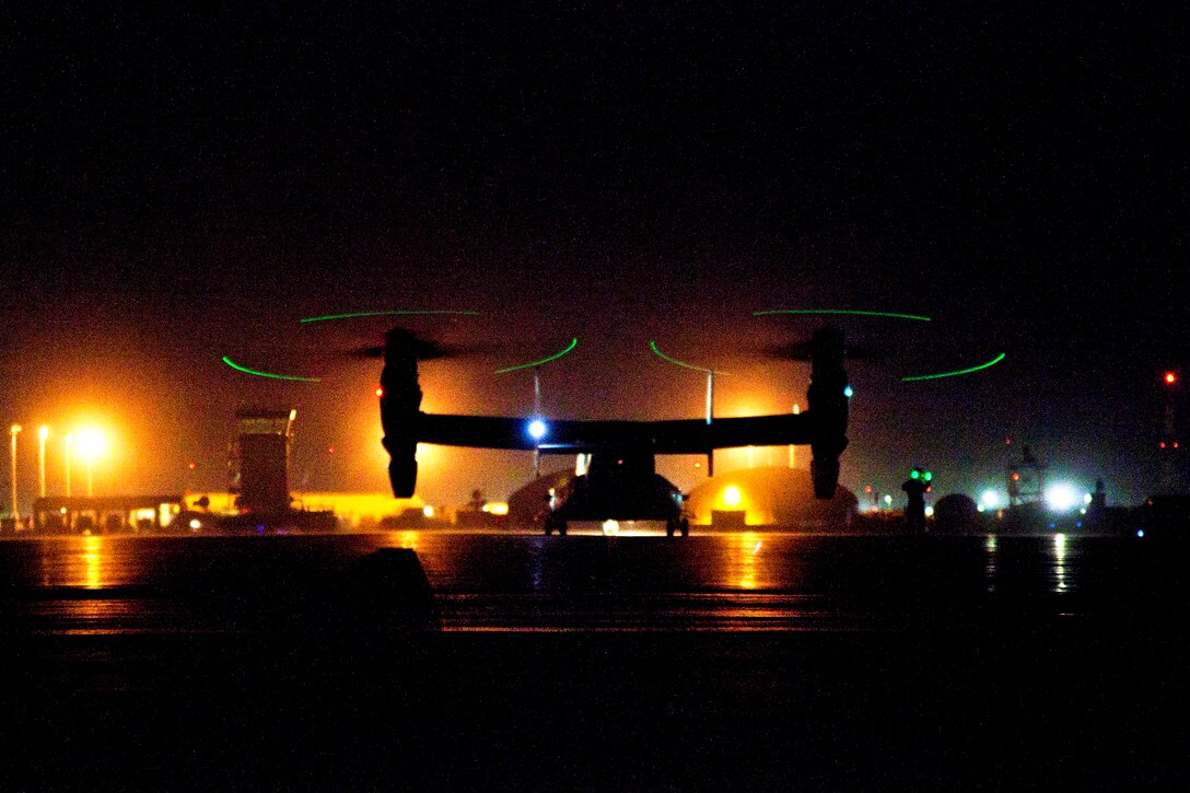 A U.S. Marine Corps MV-22B Osprey taxis before transporting U.S. Marines and Georgian soldiers conducting operation Northern Lion II on Camp Bastion in Afghanistan's Helmand province, July 3, 2013. The aircraft crew is assigned to Marine Medium Tiltrotor Squadron 264. The Georgian soldiers led the operation, conducted to deter insurgents, establish a presence and gather human intelligence in the area. 
