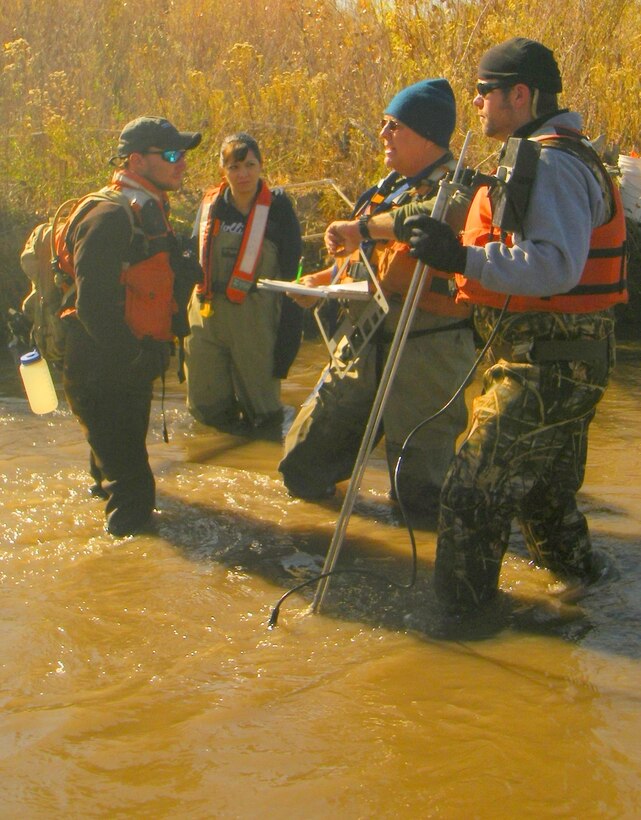 ALBUQUERQUE, N.M., -- Corps staff work with a U.S. Geological survey team to map Rio Grande silvery minnow habitat in support of endangered species management and recovery.  The silvery minnow is listed as an endangered species. Photo by Michael Porter, Nov. 9, 2011.
