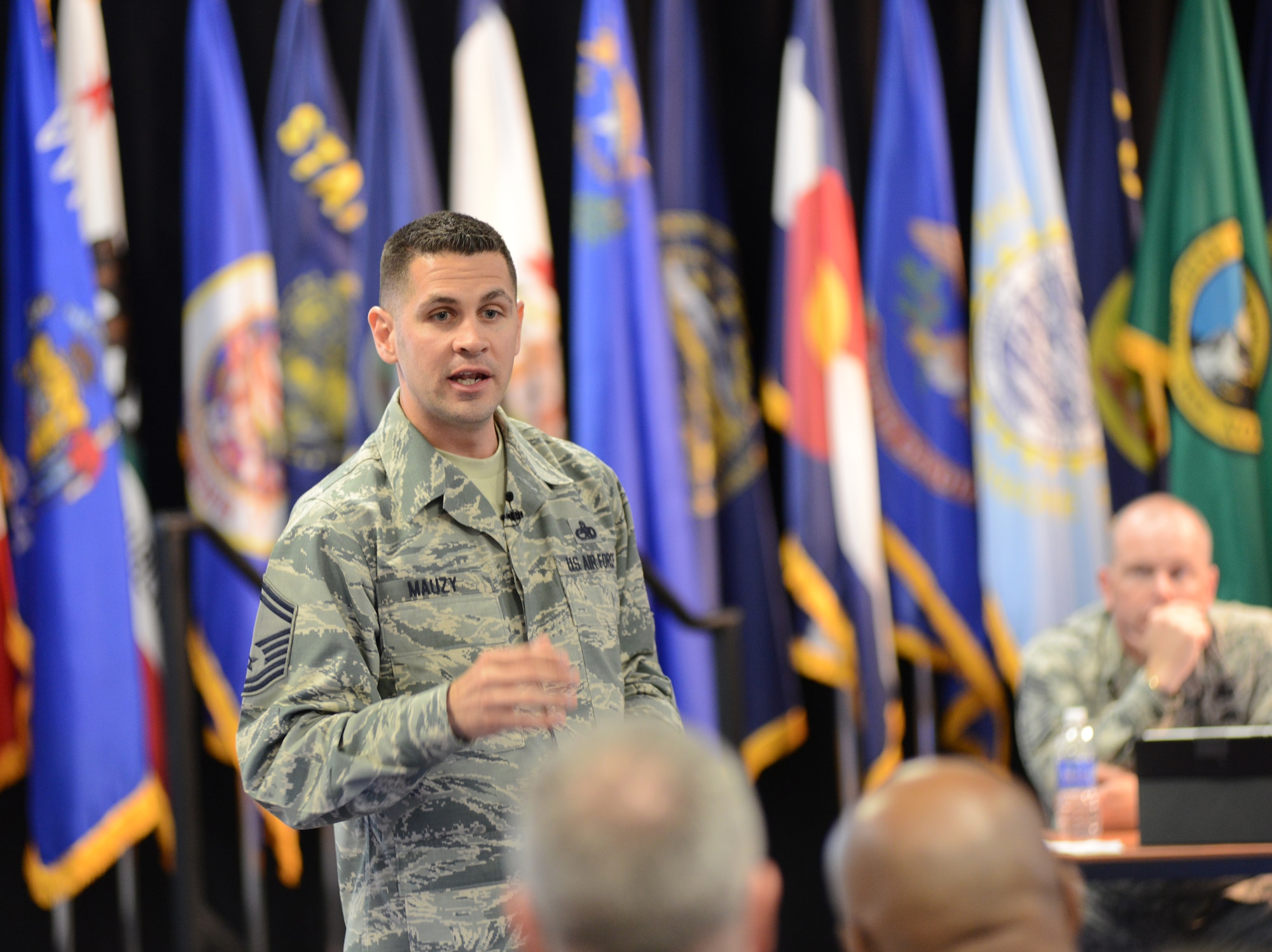 Senior Master Sgt. Darin Mauzy, Senior Enlisted Management Office supervisor, addresses the 2014 Command Chief’s Huddle, held at Volk Field Combat Readiness Training Center, Wis., May 11, 2014. Mauzy outlined the office’s mission to ensure that senior enlisted leaders in the Air National Guard have equivalent access to development opportunities as the active component, in order to ensure the Guard’s voice is heard throughout the Air Force. (U.S. Air National Guard photo by Senior Airman John E. Hillier III)