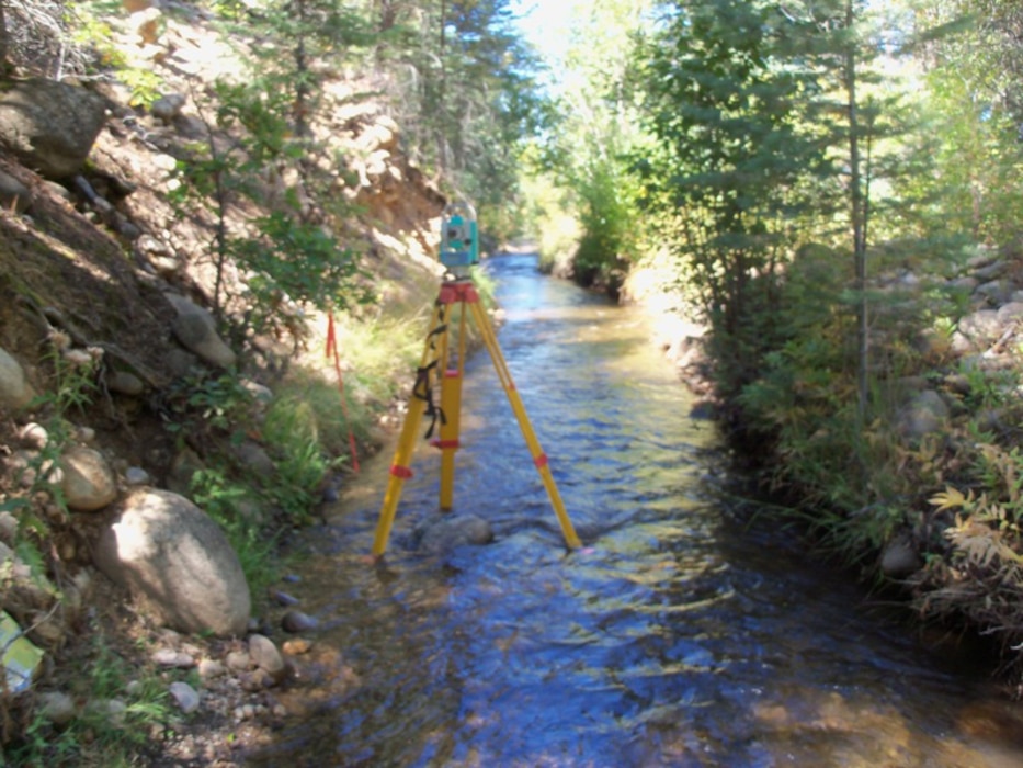 "Surveying equipment looking downstream on the San Juan Nepomuceno Acequia, near Penasco, N.M." Photo by Gary Edwards, Sept. 23, 2010.