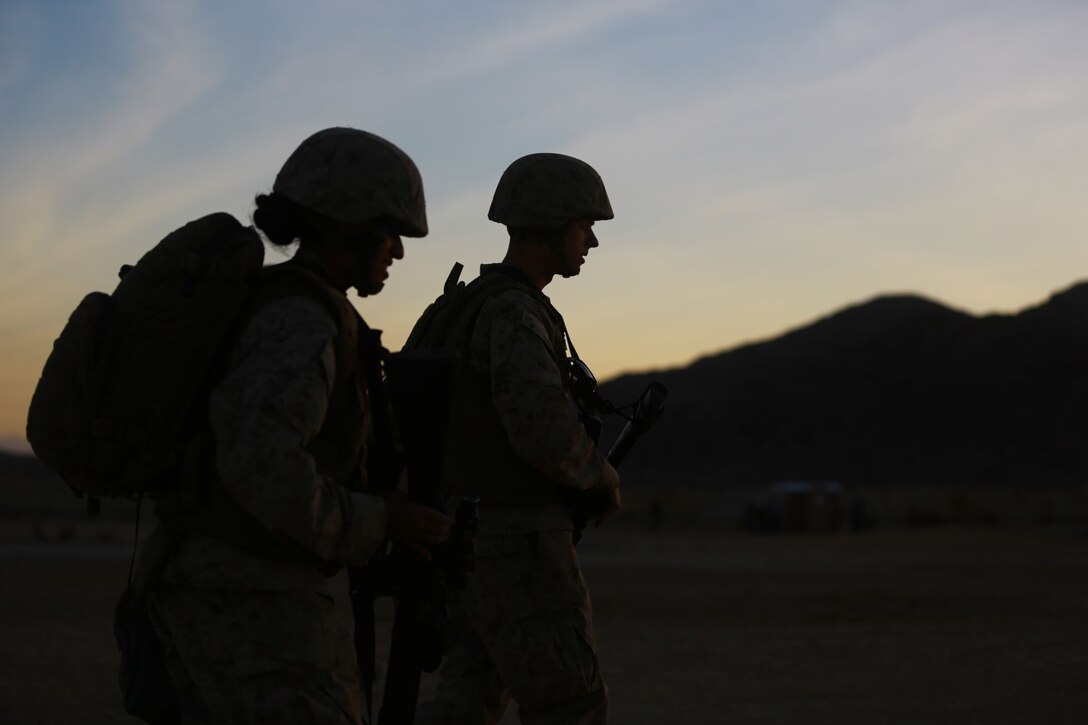 Marines with Headquarters Battalion, 1st Marine Division, participate in Exercise Desert Scimitar at Marine Corps Air Ground Combat Center Twentynine Palms, Calif., May 10, 2014. The division tests and refines its capabilities by acting as the headquarters element of I Marine Expeditionary Force throughout a variety of scenarios and live-fire ranges. Large-scale exercises like Desert Scimitar leave 1st Marine Division poised to respond to different crises across the world. (U.S. Marine Corps photograph by Sgt. Timothy Lenzo/RELEASED)