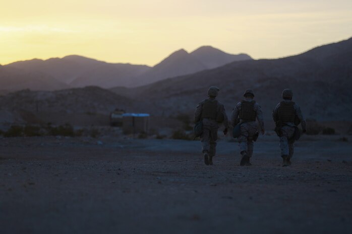 Marines with Headquarters Battalion, 1st Marine Division, participate in Exercise Desert Scimitar at Marine Corps Air Ground Combat Center Twentynine Palms, Calif., May 10, 2014. The division tests and refines its capabilities by acting as the headquarters element of I Marine Expeditionary Force throughout a variety of scenarios and live-fire ranges. Large-scale exercises like Desert Scimitar leave 1st Marine Division poised to respond to different crises across the world. (U.S. Marine Corps photograph by Sgt. Timothy Lenzo/RELEASED)