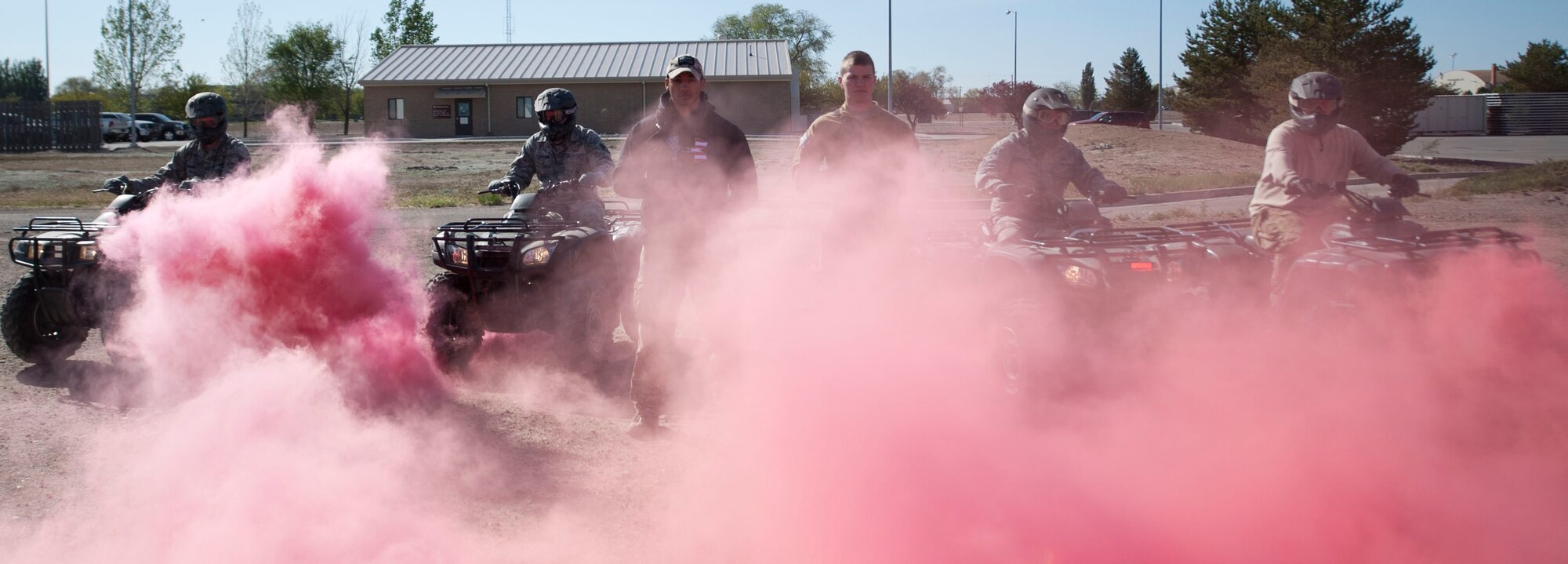 (From left to right): Staff Sgts. Corey Helton and Perry Statham, 366th Security Forces Squadron combat arms instructors, Senior Airman Terrel Minor, 366th SFS joint drug enforcement team, Staff Sgt. Michael Foster, 366th SFS investigator and Tech. Sgt. Otis Chatham, 366th SFS combat arms NCO-in-charge, pose for a group photo May 13, 2014, at Mountain Home Air Force Base, Idaho. Police week was first proclaimed in 1962 by President John F. Kennedy. (U.S. Air Force photo by Airman 1st Class Malissa Lott/RELEASED)
