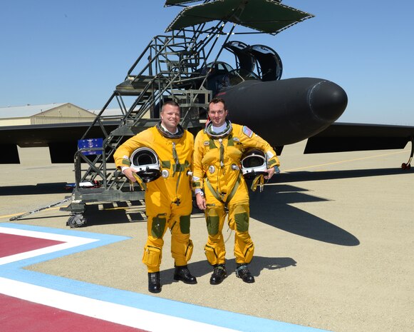 Undersecretary of the Air Force Eric Fanning (right) and Lt. Col. Mikko LaValley, 99th Reconnaissance Squadron commander, pose in front of a U-2 for at the completion of a “high-flight” at Beale Air Force Base Calif., April 29, 2014. The U-2 is routinely flown at altitudes over 70,000 feet, as a result the pilot must wear a full pressure suit similar to those worn by NASA astronauts. (U.S. Air Force photo by John Schwab)