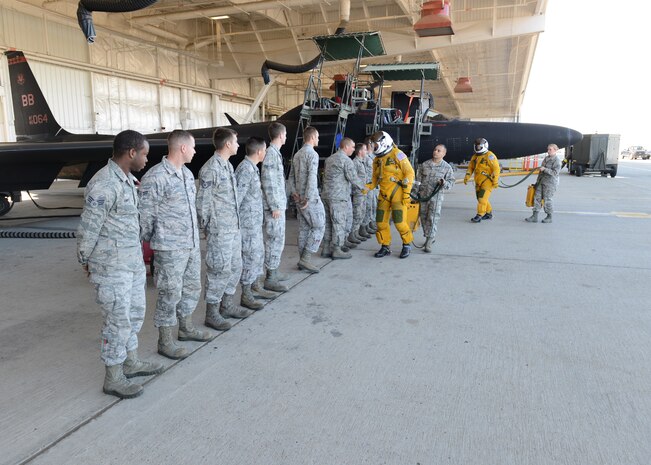 Undersecretary of the Air Force Eric Fanning (front) and Lt. Col. Mikko LaValley, 99th Reconnaissance Squadron commander, thank ground crew members of Team Beale during a “high-flight” at Beale Air Force Base, Calif., April 29, 2014. The U-2 is capable of flying above 70,000 feet. (U.S. Air Force photo by John Schwab)  