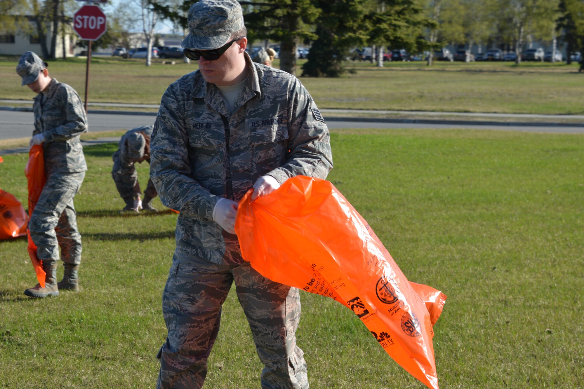 Members of the 477th Fighter Group, Alaska's only Air Force Reserve unit, participated in the Anchorage Chamber of Commerce citywide cleanup May 9. (U.S. Air Force/Capt. Ashley Conner)