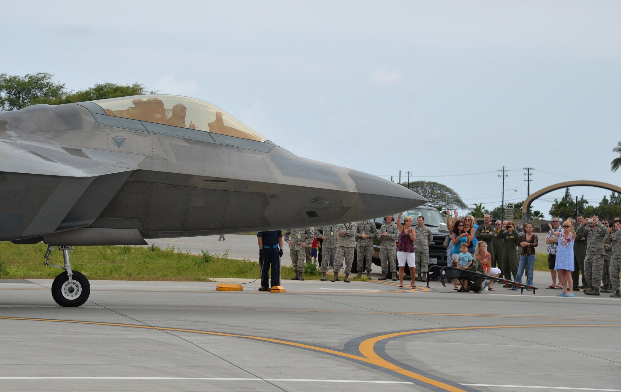 Col. Terry Scott, 15th Wing vice commander, throws up a “shaka” hand gesture after a training mission at Joint Base Pearl Harbor-Hickam, Hawaii, May 9, 2014. The mission was Scott’s “fini-flight,” a ceremonial final flight for Air Force pilots. Scott is retiring after 33 years of enlisted and commissioned service. (U.S. Air Force photo/Staff Sgt. Alexander Martinez)