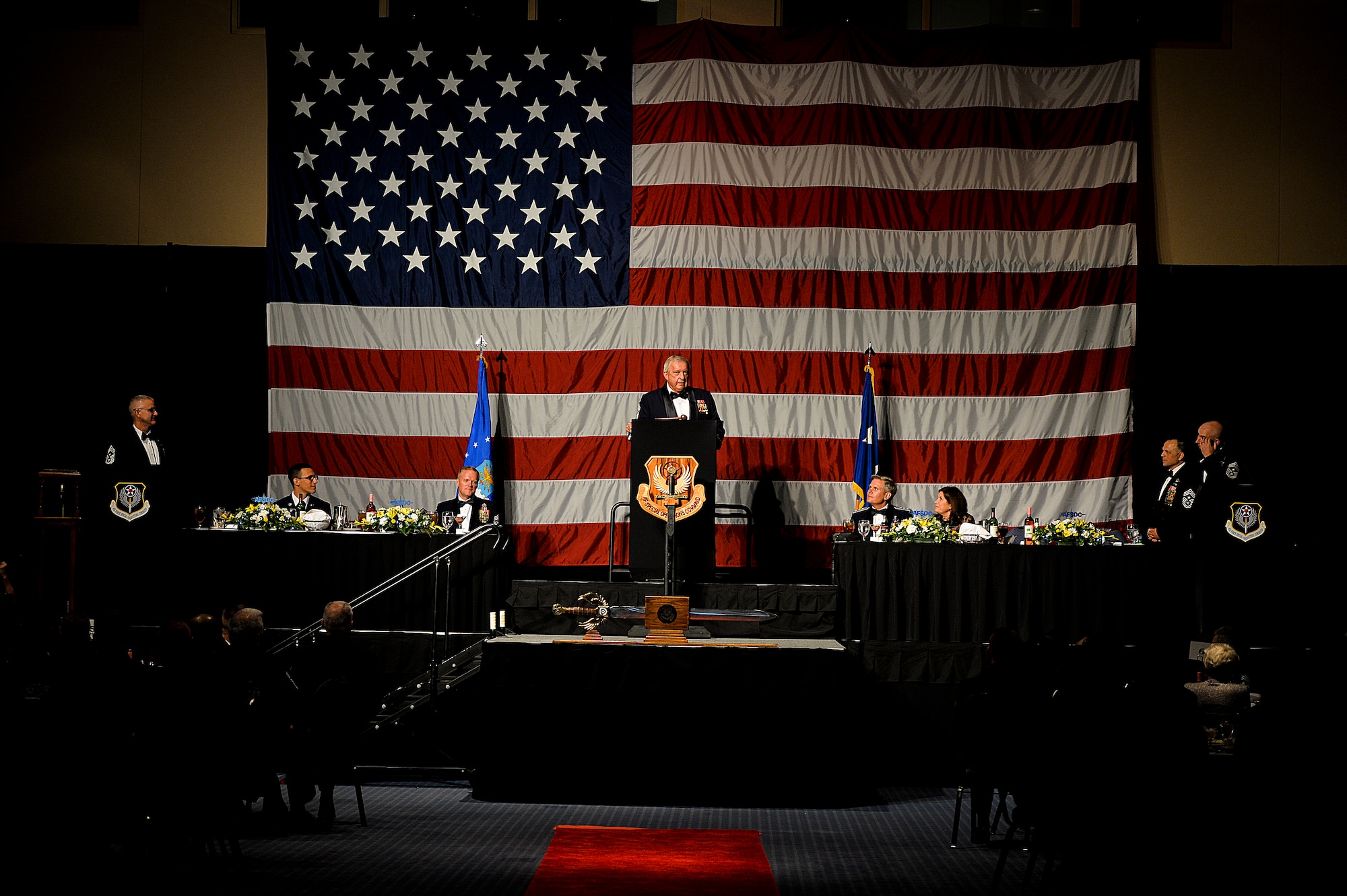 Chief Master Sgt. of the Air Force #9 Jim Binnicker speaks during an Order of the Sword ceremony at the Emerald Coast Convention Center in Fort Walton Beach, Fla., May 9, 2014. Lt. Gen. Eric Fiel, Air Force Special Operation Command commander, was the ninth officer inducted into AFSOC’s Order of the Sword. (U.S. Air Force photo/Senior Airman Christopher Callaway)