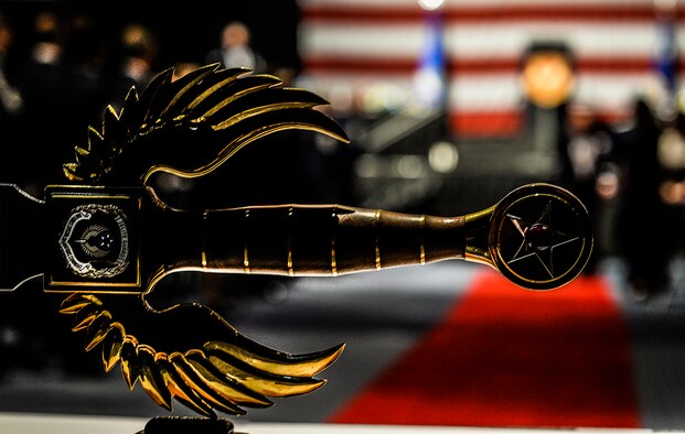 The Air Force Special Operations Command sword sits on its pedestal during an Order of the Sword ceremony at the Emerald Coast Convention Center in Fort Walton Beach, Fla., May 9, 2014. Lt. Gen. Eric Fiel, AFSOC commander, was the ninth officer inducted into AFSOC’s Order of the Sword. (U.S. Air Force photo/Senior Airman Christopher Callaway)