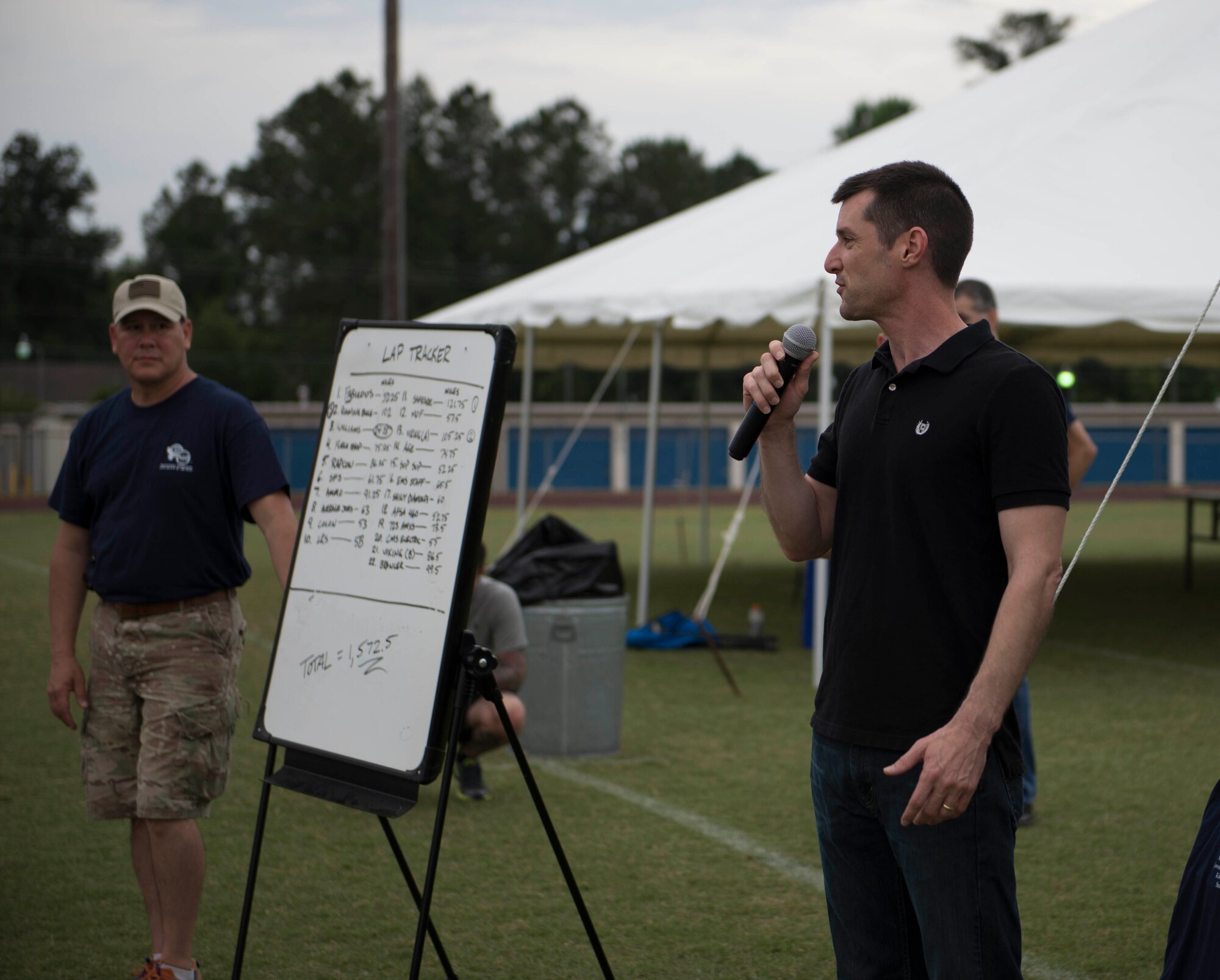 U.S. Air Force Chief Master Sgt. Matthew Wells, 23d Wing command chief, gives some closing comments during the Inaugural Tiger Run in Valdosta, Ga., May 10, 2014. Wells thanked the volunteers and runners for their participation in the event and urged everyone to come back for next year’s Tiger Run. (U.S. Air Force photo by Airman Dillian Bamman/Released)