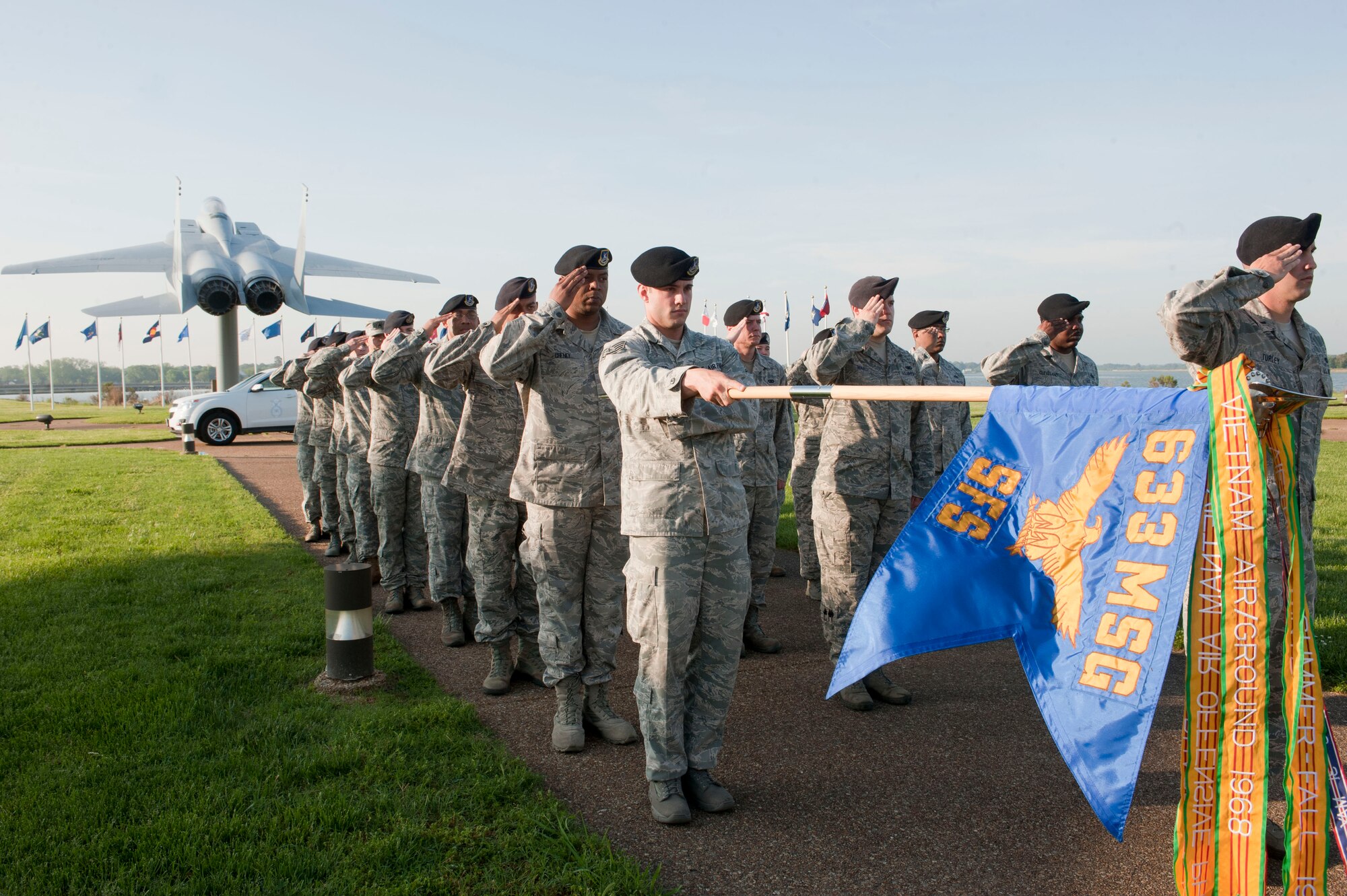 Joint Base Langley-Eustis members salute during the National Police Week opening ceremony at Langley Air Force Base, Va., May 12, 2014. National Police Week, May 11-17, memorializes law enforcement officers who laid down their lives in service to the nation. (U.S. Air Force photo by Staff Sgt. Stephanie R. Plichta/Released)