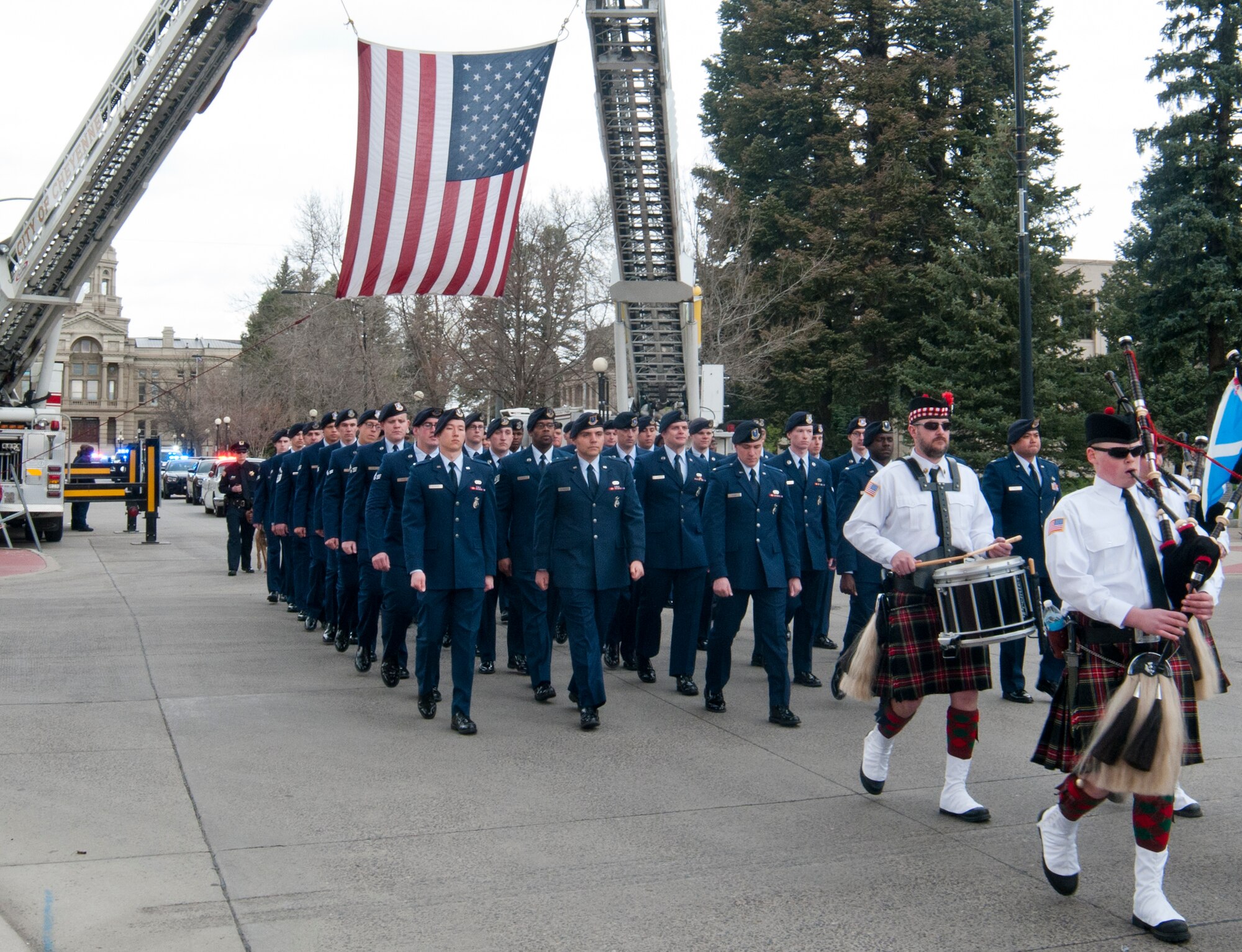 Ninetieth Security Forces Group Airmen from F.E. Warren Air Force Base, Wyo., march down Capitol Avenue during the National Police Week parade in a show of solidarity with Wyoming and Cheyenne Law Enforcement officers May 10, 2014. (U.S. Air Force photo by Airman 1st Class Jason Wiese)