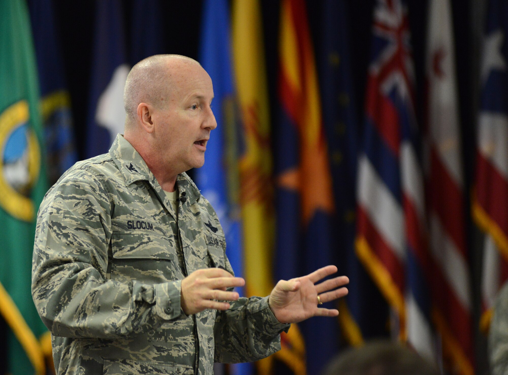 Col. Doug Slocum, inspector general for the Air National Guard, discusses the Air Force Inspection System during the 2014 Executive Safety Summit at Volk Field Combat Readiness Training Center, Wis., May 13, 2014. This year’s conference theme: “Leaders: Don’t Let Your Guard Down,” covers a wide range of topics including safety, resilience, diversity and mishap prevention. (U.S. Air National Guard photo by Senior Airman John E. Hillier/Released)