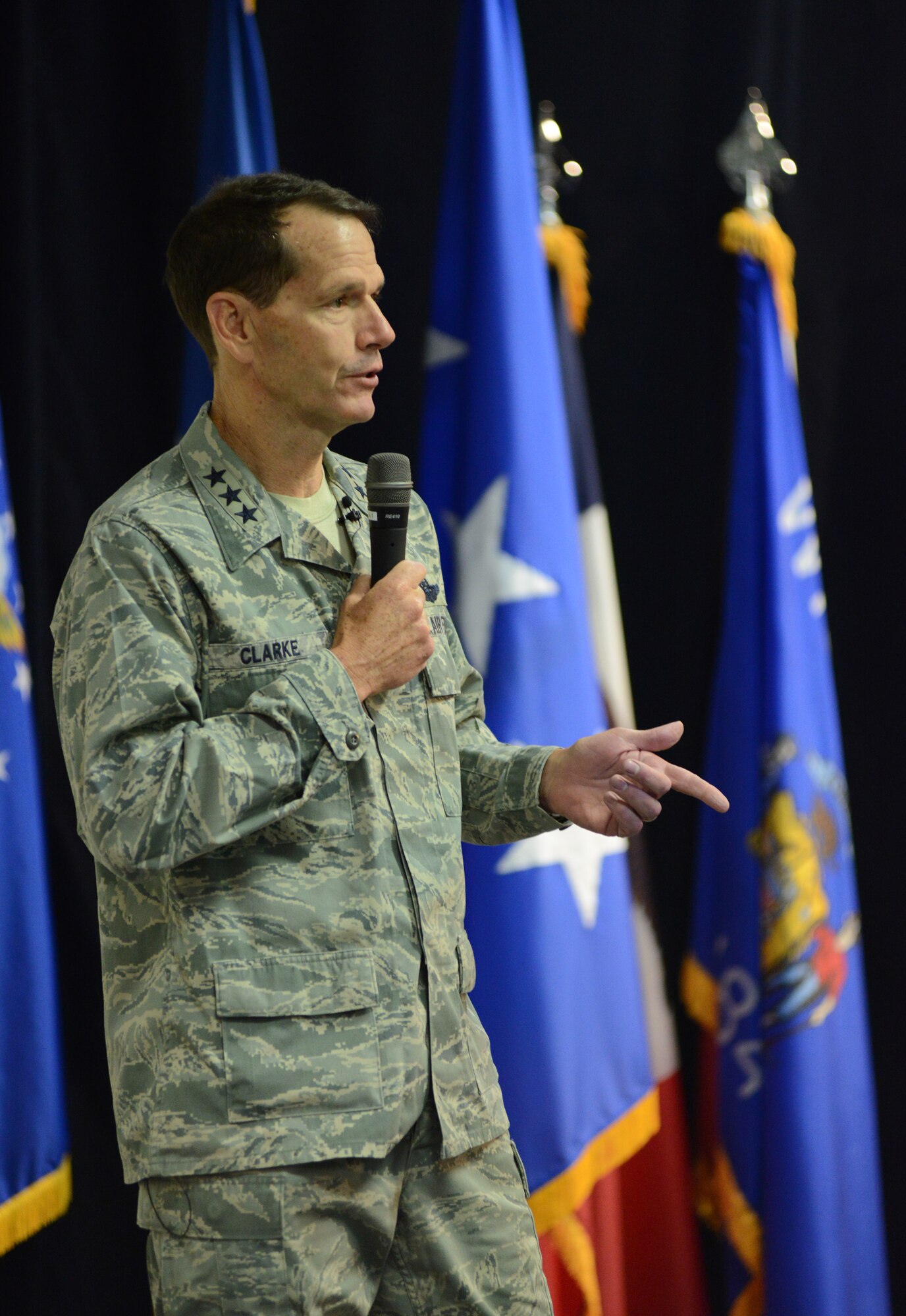 Lt. Gen. Stanley E. Clarke III, the director of the Air National Guard, delivers his welcome remarks to senior leaders during the 2014 Executive Safety Summit at Volk Field Combat Readiness Training Center, Wis., May 13, 2014. This year’s conference theme: “Leaders: Don’t Let Your Guard Down,” covers a wide range of topics including safety, resilience, diversity and mishap prevention. (U.S. Air National Guard photo by Senior Airman John E. Hillier/Released)