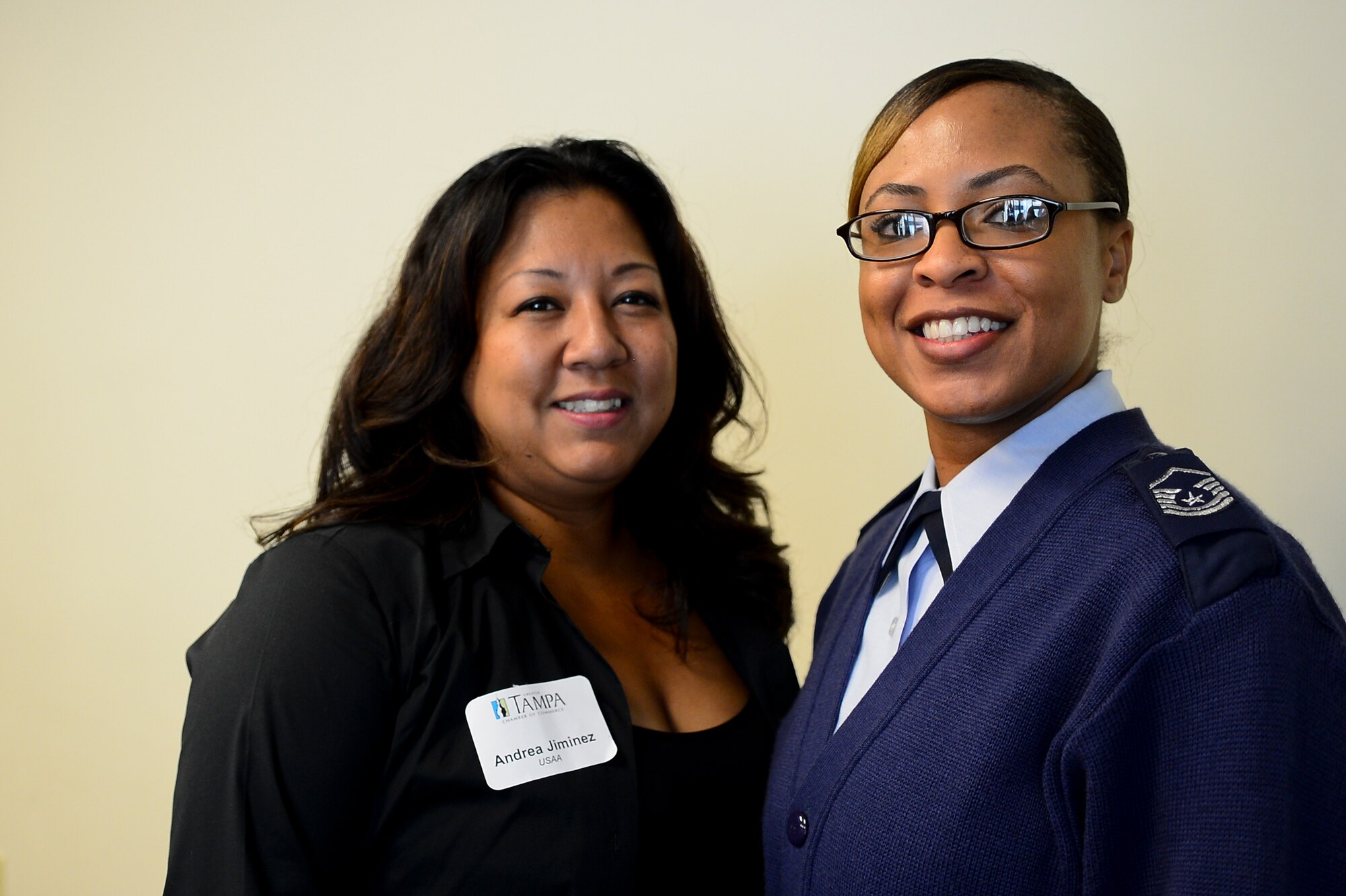 Master Sgt. Jammie Thompson, 6th Aerospace Medicine Squadron public health, and Andrea Jiminez, United Services Automobile Association director of mortgage fulfillment, pose for a photo at the Greater Tampa Chamber of Commerce before beginning day two of Operation Partnership May 8, 2014. Service members paired up with local civic leaders for a day to gain a better understanding of what goes on outside the gates of MacDill Air Force Base, Fla. (U.S. Air Force photo by Airman 1st Class Ned T. Johnston/Released)