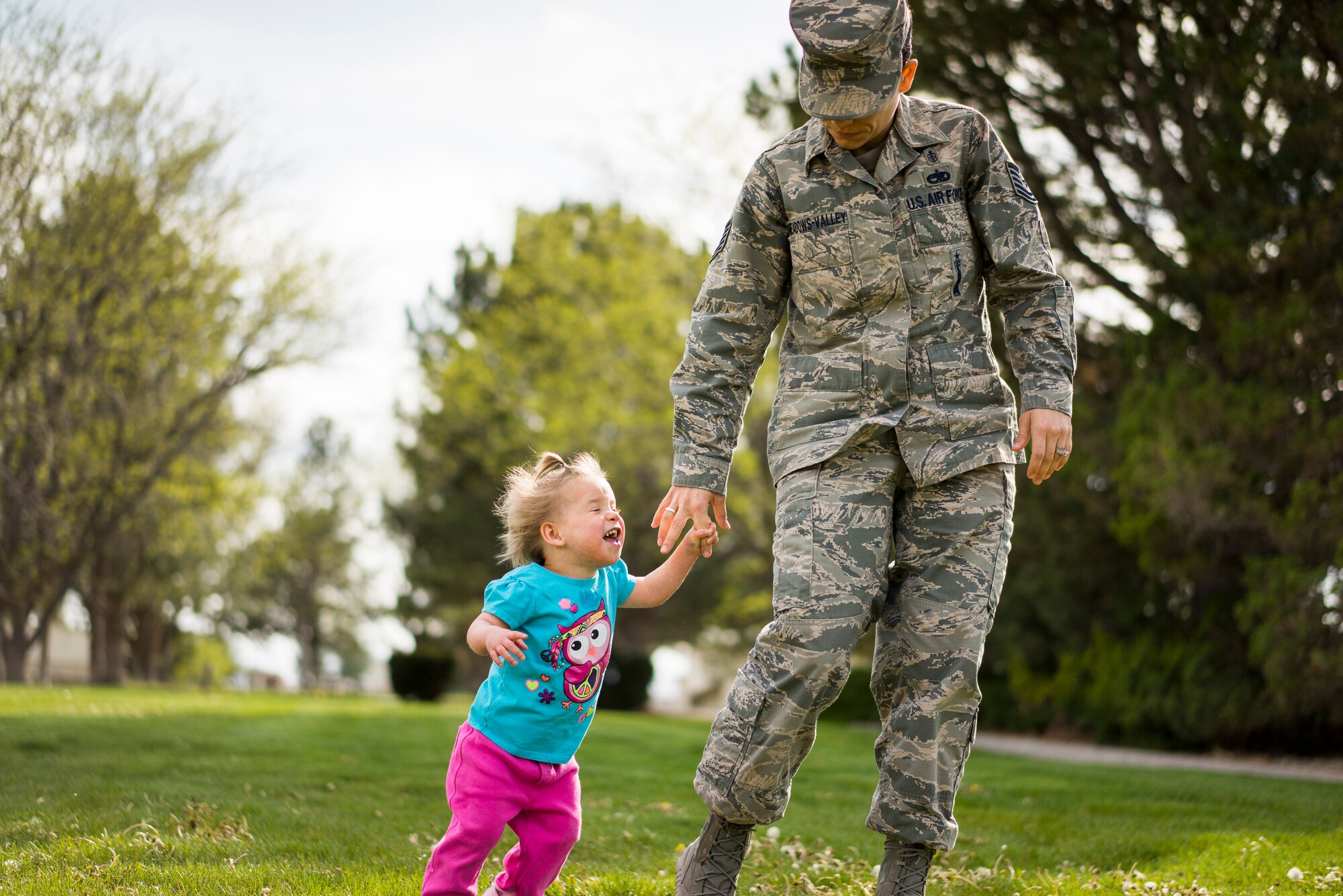 Oleksandra Valley, daughter of Tech. Sgt. Jamie Meadows-Valley from the 366th Aerospace Medicine Squadron, smiles as the winds of the high plains at Mountain Home Air Force Base, Idaho, hit her face on May 6, 2014. Friends of the family talk about how happy "Sandie" has been since arriving at her new home. (U.S. Air Force photo/Tech. Sgt. Samuel Morse)