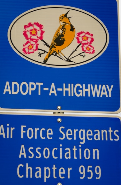 A road sign marks a section of the highway 83 bypass that is maintained by chapter 959 of the Air Force Sergeants Association in Minot N.D., May 10, 2014. Members of chapter 959 gathered at 9 a.m. to begin cleanup on their section of highway near the Hyatt House hotel. (U.S. Air Force photo/Senior Airman Stephanie Sauberan)