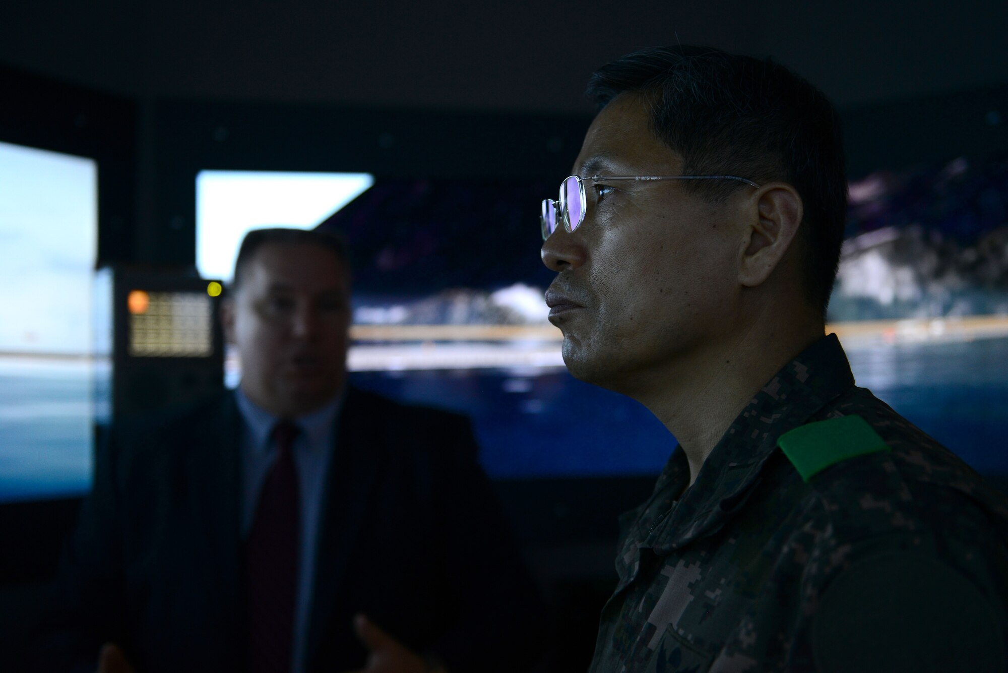 Republic of Korea Brig. Gen Jong Goo Lee, Republic of Korea Transportation Command commander, visited the Simulation Center during a tour of the Transportation Corps' maritime training capabilities at Fort Eustis, Va., May 13, 2014. Lee was able to experience a few of the training simulators held at the center. (U.S. Air Force photo by Airman 1st Class Kimberly Nagle/Released)