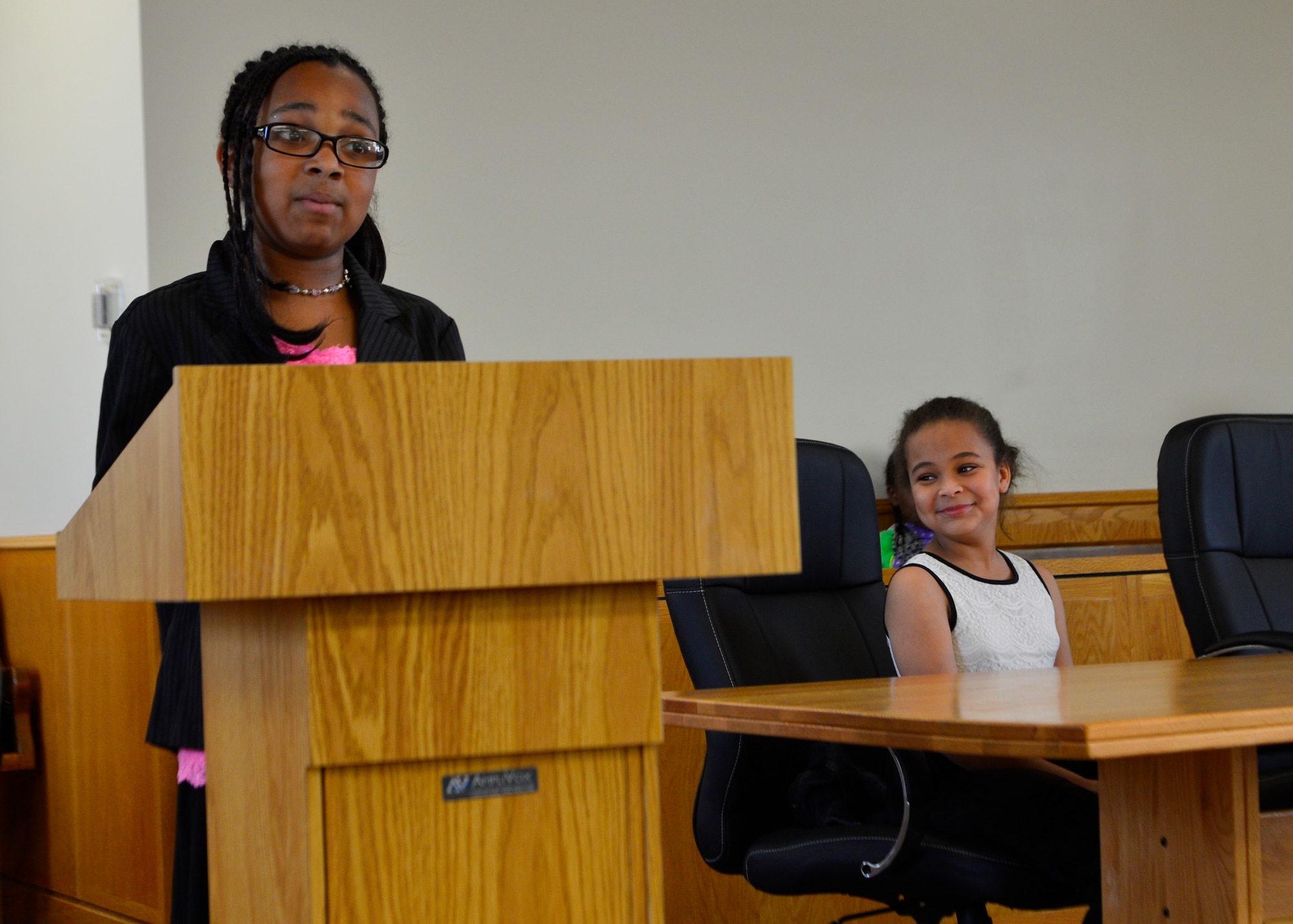 Faith King, who portrayed a defense attorney, questions a witness during a mock trial May 2, 2014, at Dover Air Force Base, Del. Children from the youth center participated in a mock trial of Goldilocks and the Three Bears to gain first-hand experience of how a trial is performed. (U.S. Air Force photo/Airman 1st Class William Johnson)