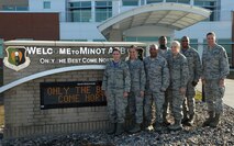 Airfield Management activates the secondary crash net, and relays critical, time sensitive information regarding aircraft in-flight and ground emergencies to over 12 first responders. Airfield Management assists pilots with pre-flight planning functions, disseminates approximately 9.6 thousand flight plans per year into the National Airspace System and issues Notices to Airmen to relay safety of flight information to aircrew across the globe. Additionally, Airfield Management inspects over 11 million square feet of airfield daily which includes checking for obstructions to air navigation, monitoring construction projects, identifying foreign object debris, pavement distresses  and verifying that all airfield signs and markings are correctly displayed. Airfield Management also directs snow control operations and establishes snow removal priorities. Finally, Airfield Management oversees the Wing’s Airfield Driving Program and trains over 1300 drivers annually to operate vehicles safely on the airfield.