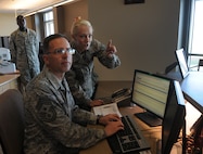 Airfield Management activates the secondary crash net, and relays critical, time sensitive information regarding aircraft in-flight and ground emergencies to over 12 first responders. Airfield Management assists pilots with pre-flight planning functions, disseminates approximately 9.6 thousand flight plans per year into the National Airspace System and issues Notices to Airmen to relay safety of flight information to aircrew across the globe. Additionally, Airfield Management inspects over 11 million square feet of airfield daily which includes checking for obstructions to air navigation, monitoring construction projects, identifying foreign object debris, pavement distresses  and verifying that all airfield signs and markings are correctly displayed. Airfield Management also directs snow control operations and establishes snow removal priorities. Finally, Airfield Management oversees the Wing’s Airfield Driving Program and trains over 1300 drivers annually to operate vehicles safely on the airfield.