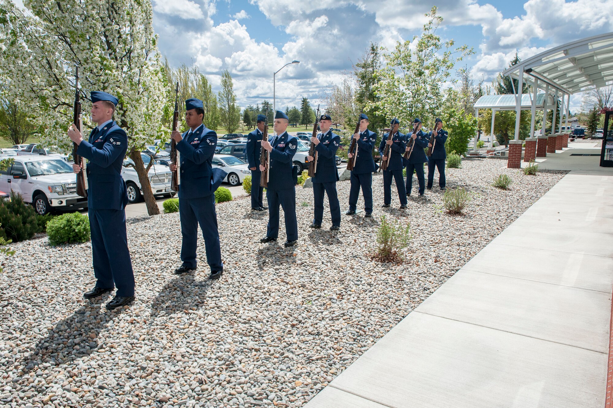 Fairchild Honor Guard graduates perform firing party duties as part of a military funeral presentation during their graduation ceremony in the Red Morgan Event Center at Fairchild Air Force Base, Wash., May 9, 2014. Fairchild’s honor guard performs military honors for various events and ceremonies across the Inland Northwest every week as the installation’s front-line ambassadors. Each member from nearly every career field serves a four month rotation. (U.S. Air Force photo by Staff Sgt. Benjamin W. Stratton/Released)