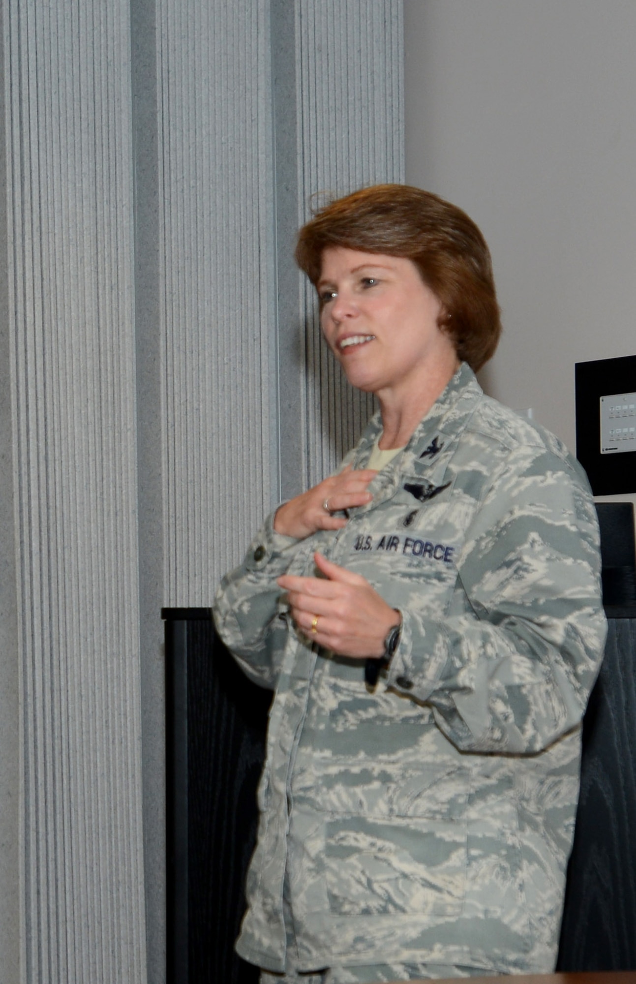 U.S. Air Force Col. Julie Stola, U.S. Air Forces Central Command deputy surgeon general and a Nurse Corps officer, speaks about her 24-year Air Force medical career during a large-group mentorship session during Nurse and Medical Technician Week May 9, 2014, at Shaw Air Force Base, S.C. The 20th Medical Group recognized the nearly 100 nurses and technicians who provide medical care and maintain mission readiness for the Air Force’s largest combat F-16CJ Fighting Falcon wing. (U.S. Air Force photo by Senior Airman Laura L. Valentine)