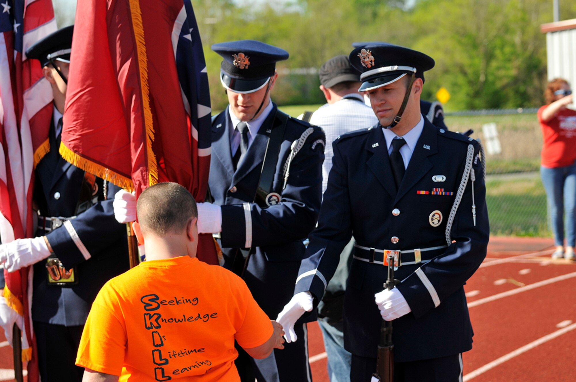 AEDC personnel volunteer at the Area 13 Special Olympics on April 24 at the Tullahoma High School stadium. (Photo by Rick Goodfriend)