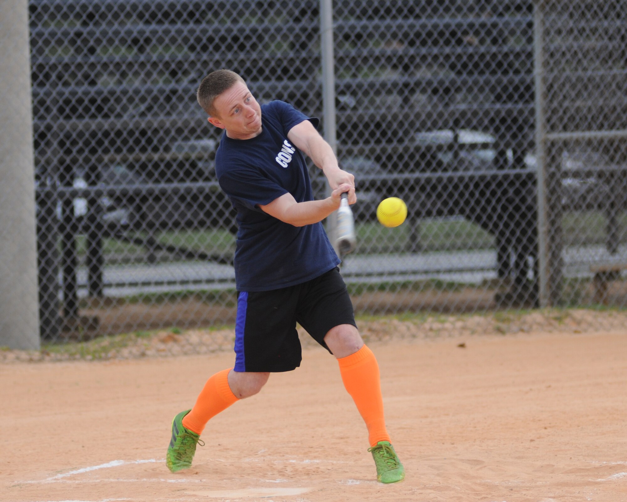 Blakeny Pittman, 81st Contracting Squadron, hits the ball during an intramural softball game against the 81st Surgical Operations Squadron May 8, 2014, at Keesler Air Force Base, Miss.  81st CONS defeated 81st MSGS, 14-5. (U.S. Air Force photo by Kemberly Groue)