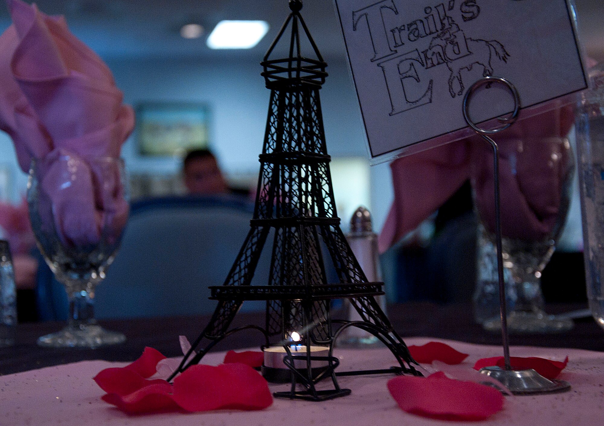 140510-F-GZ967-005 A miniature Eiffel Tower stands in the center of one of the tables during the Mother’s Day Brunch May 10 in the Trail’s End Club. Each table had unique to help mothers to relax the day before Mother’s Day. (U.S. Air Force photo by Airman 1st Class Brandon Valle)