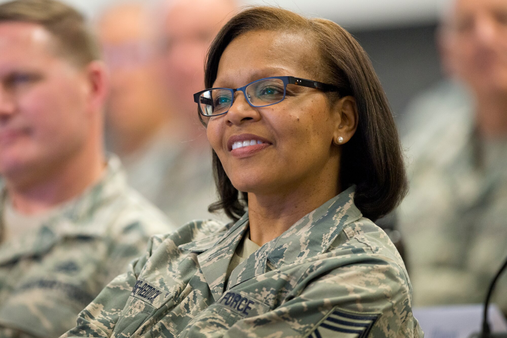 Chief Master Sgt. Glenda B. Chambliss-Reddick, state command chief master sergeant, Joint Forces Headquarters, Ala. ANG, listens to a presentation during the annual Command Chief’s Huddle at Volk Field Combat Readiness Training Center, Wis., May 11, 2014. The Command Chief’s Huddle brings together more than 150 Command Chief Master Sergeants and other senior enlisted leaders from 89 Air National Guard wings and units, representing 54 states, territories and the District of Columbia to openly discuss a wide range of issues and challenges facing the ANG. Attendees will also gain a better understanding of national issues relating to the ANG mission and share that knowledge with the 91,000 enlisted Air Guardsmen they represent. (U.S. Air National Guard photo by Master Sgt. Marvin R. Preston/Released)