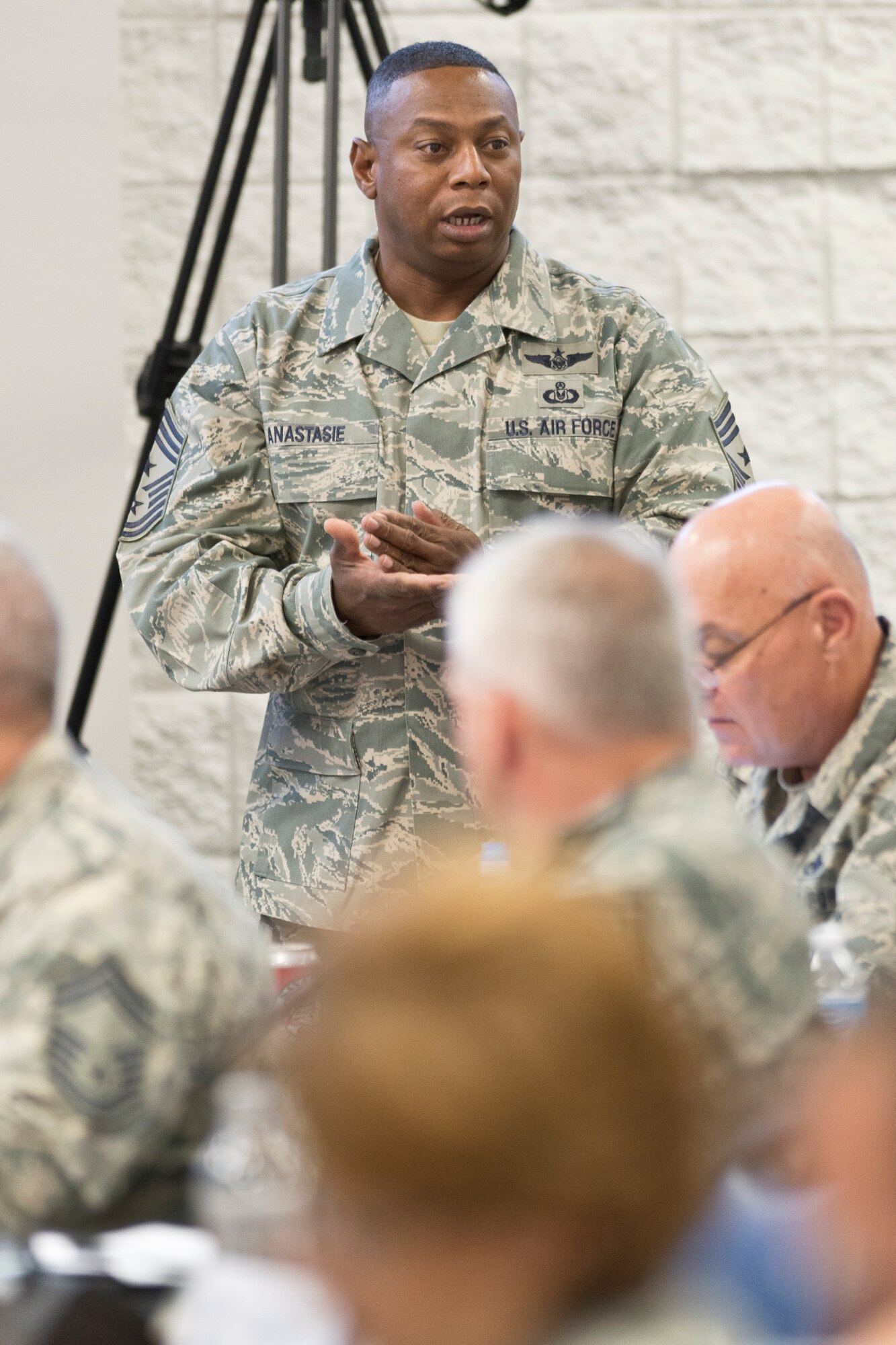 Chief Master Sgt. Lorenzo Anastacie, the command chief master sergeant for the Georgia Air National Guard, asks a question during the annual Command Chief’s Huddle at Volk Field Combat Readiness Training Center, Wis., May 11, 2014. The Command Chief’s Huddle brings together more than 150 Command Chief Master Sergeants and other senior enlisted leaders from 89 Air National Guard wings and units, representing 54 states, territories and the District of Columbia to openly discuss a wide range of issues and challenges facing the ANG. Attendees will also gain a better understanding of national issues relating to the ANG mission and share that knowledge with the 91,000 enlisted Air Guardsmen they represent. (U.S. Air National Guard photo by Master Sgt. Marvin R. Preston/Released)