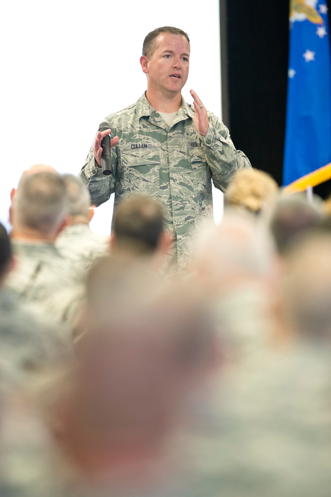 Chief Master Sgt. Gregory Cullen, the command chief master sergeant for the Wisconsin Air National Guard, welcomes senior enlisted leaders to the annual Command Chief’s Huddle at Volk Field Combat Readiness Training Center, Wis., May 11, 2014. The Command Chief’s Huddle brings together more than 150 Command Chief Master Sergeants and other senior enlisted leaders from 89 Air National Guard wings and units, representing 54 states, territories and the District of Columbia to openly discuss a wide range of issues and challenges facing the ANG. Attendees will also gain a better understanding of national issues relating to the ANG mission and share that knowledge with the 91,000 enlisted Air Guardsmen they represent. (U.S. Air National Guard photo by Master Sgt. Marvin R. Preston/Released)