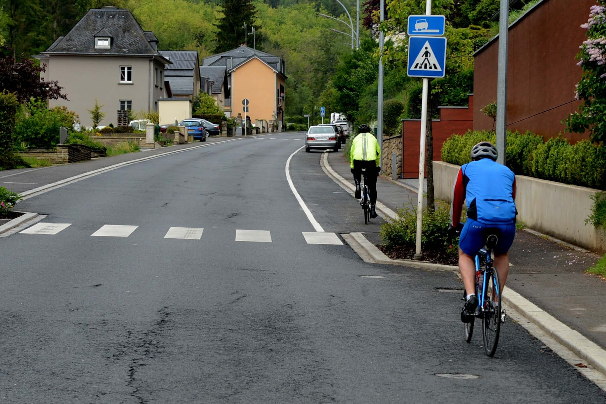 Riders cycle through a village on the route to Paris, May 8, 2014. Participants made occasional stops to rehydrate and eat meals during their 290 mile journey to the Eiffel Tower. (U.S. Air Force photo by Airman 1st Class Kyle Gese/Released)