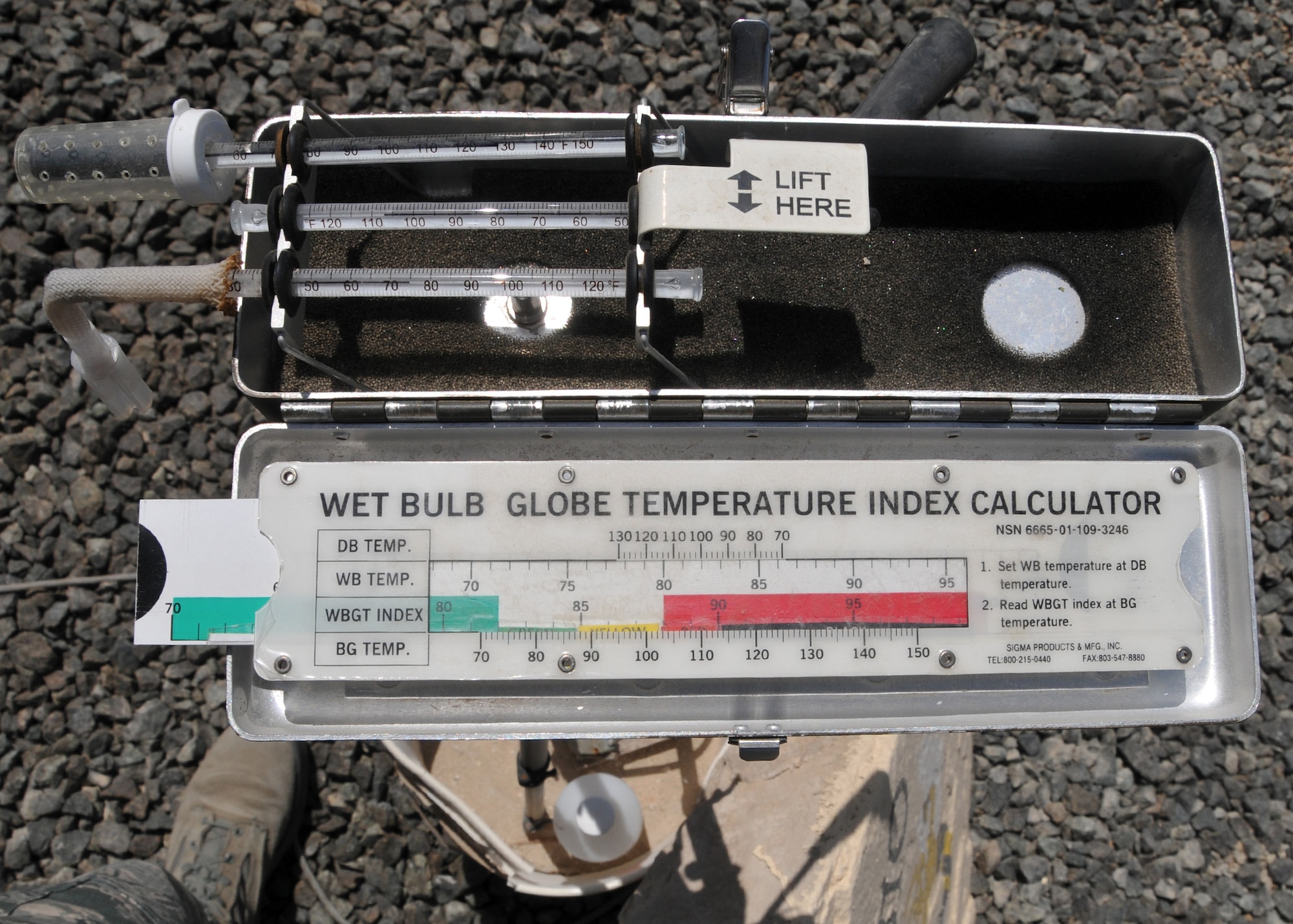 The wet bulb globe temperature index calculator measures the current radiant temperature, ambient temperature and the humidity. 380th Expeditionary Medical Group bioenvironmental engineering technicians use this tool to monitor the readings for personnel deployed at an undisclosed location in Southwest Asia May 7, 2014. (U.S. Air Force photo by Senior Master Sgt. Eric Peterson/Released)
