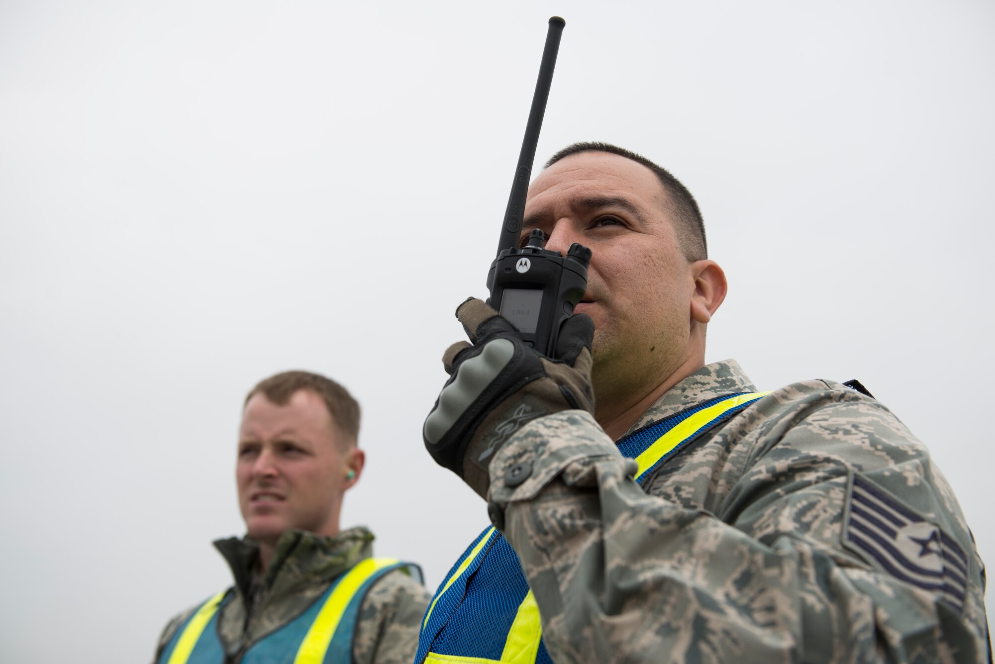 Tech. Sgt. Noe Navarro-Gonzalez, 374th Logistical Readiness Squadron air transportation operations NCO in charge, communicates with the cargo control center during a Samurai Readiness Inspection at Yokota Air Base, Japan, May 13, 2014. During the inspection, the 374 LRS practiced the planning, moving and loading of cargo for three simulated flights. (U.S. Air Force photo by Staff Sgt. Cody H. Ramirez/Released)