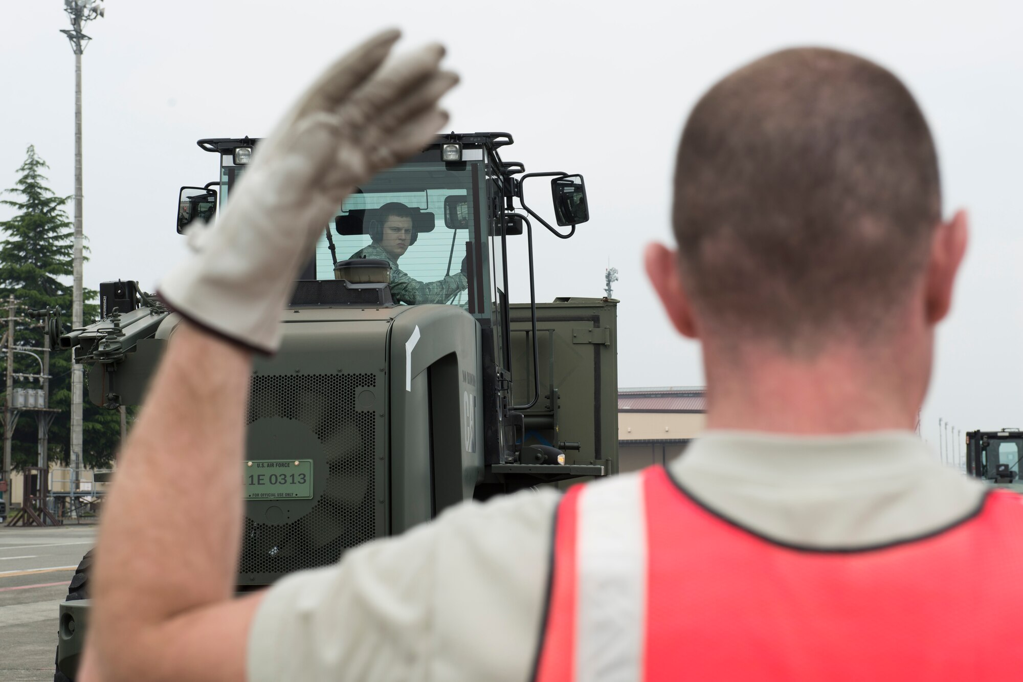 Airmen with the 374th Logistical Readiness Squadron air transportation operations shop as well as augmentees, in-check cargo during a Samurai Readiness Inspection at Yokota Air Base, Japan, May 13, 2014. The inspection included a simulated typhoon scenario to test Team Yokota’s humanitarian aid and disaster relief effort capabilities. (U.S. Air Force photo by Staff Sgt. Cody H. Ramirez/Released)