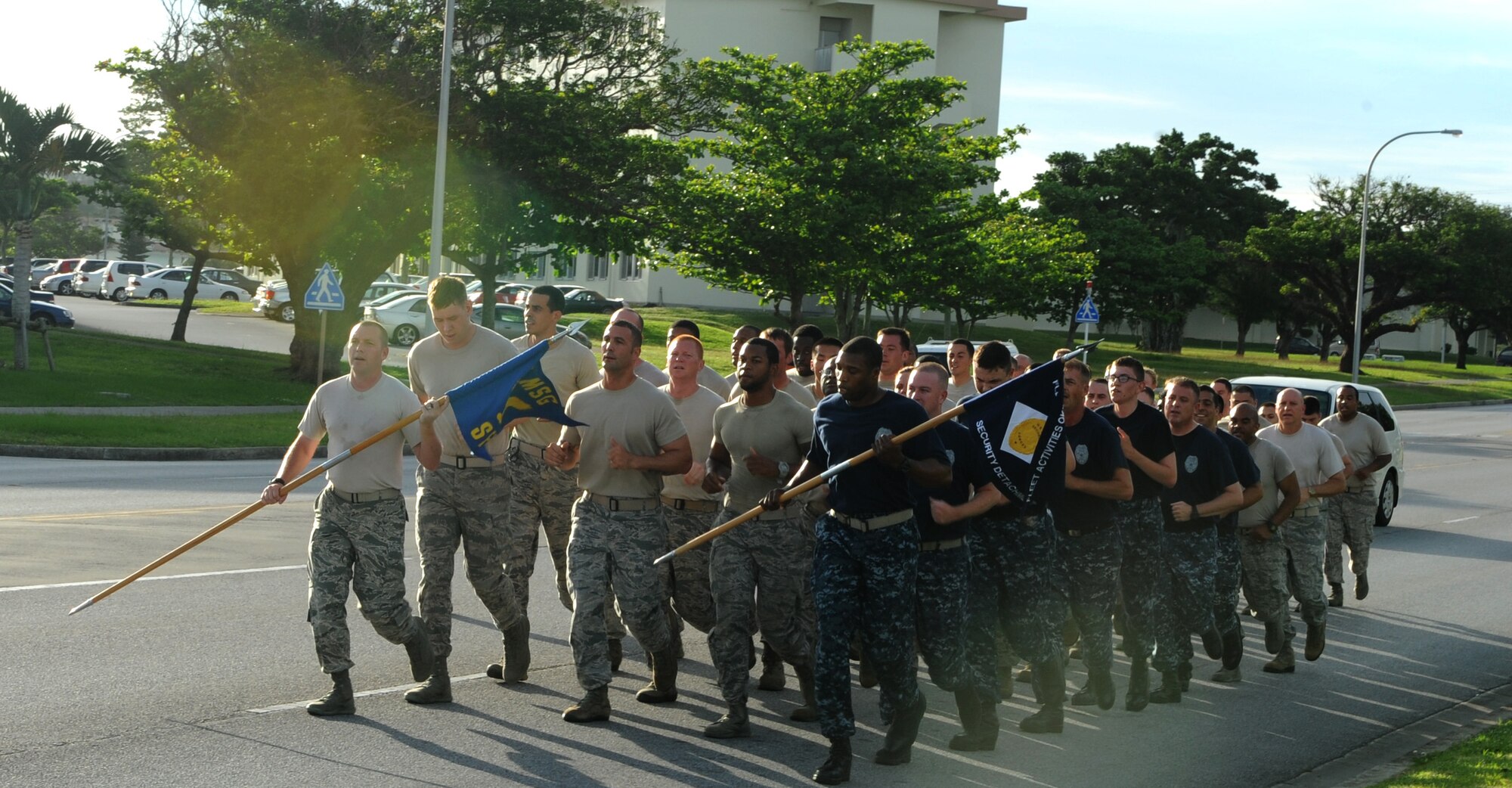 Members from the 18th Security Forces Squadron participate in a no blouse or ABU cover run also known as  "boots and utes" run in honor of National Police Week on Kadena Air Base, Japan May 12, 2014. Police Week is a week for honoring fallen comrades and military police members from around the world through various events. The 18th SFS hosted a defenders challenge, 24 hour vigil run, "jail and bail," and memorial for this year's Police Week. (U.S. Air Force photo by Airman 1st Class Keith James)