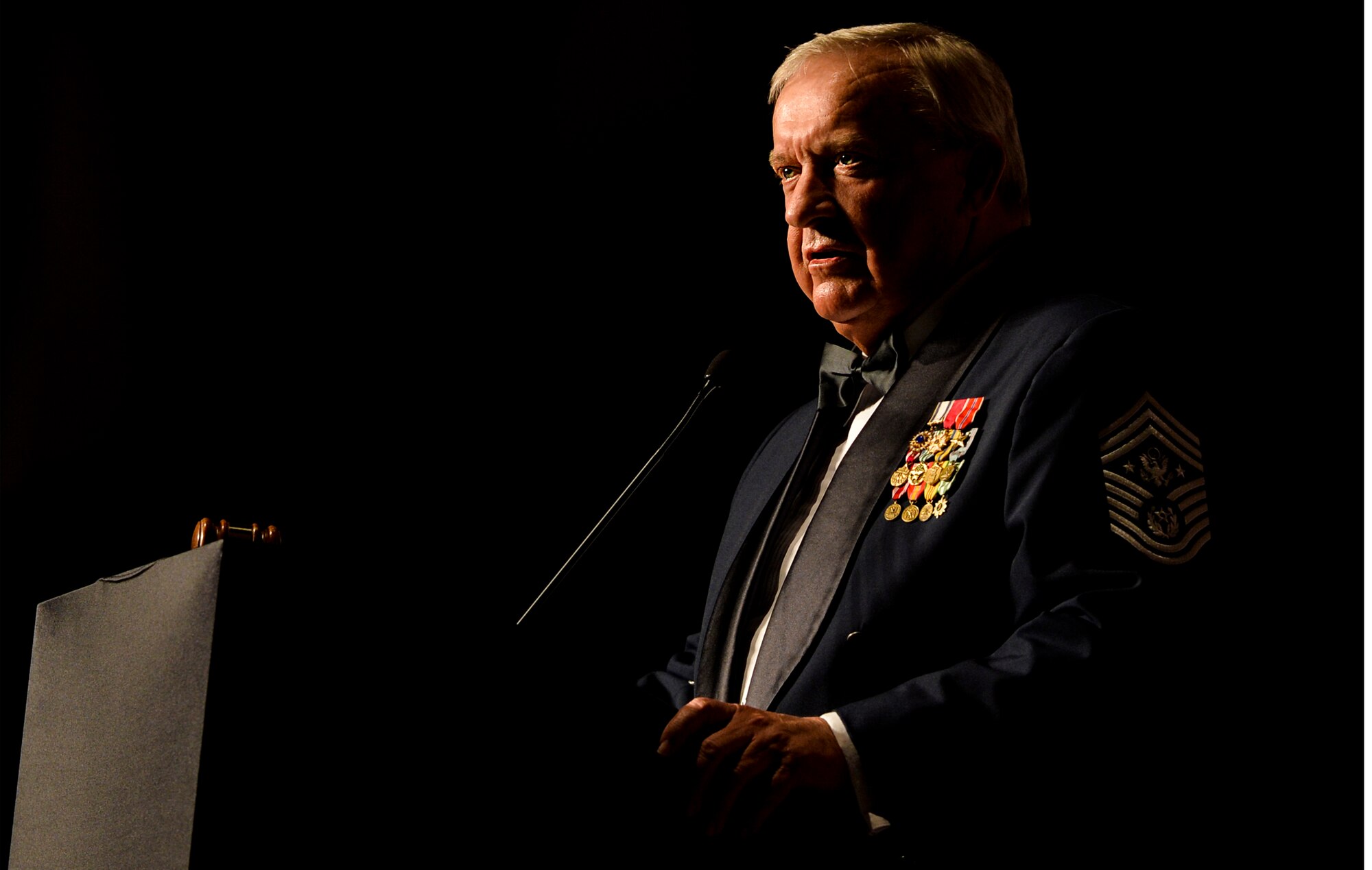 Chief Master Sgt. of the Air Force #9 Jim Binnicker, speaks during an Order of the Sword ceremony at the Emerald Coast Convention Center in Fort Walton Beach, Fla., May 9, 2014. Lt. Gen. Eric Fiel, Air Force Special Operation Command commander, was the ninth officer inducted into AFSOC’s Order of the Sword. (U.S. Air Force photo/Senior Airman Christopher Callaway)