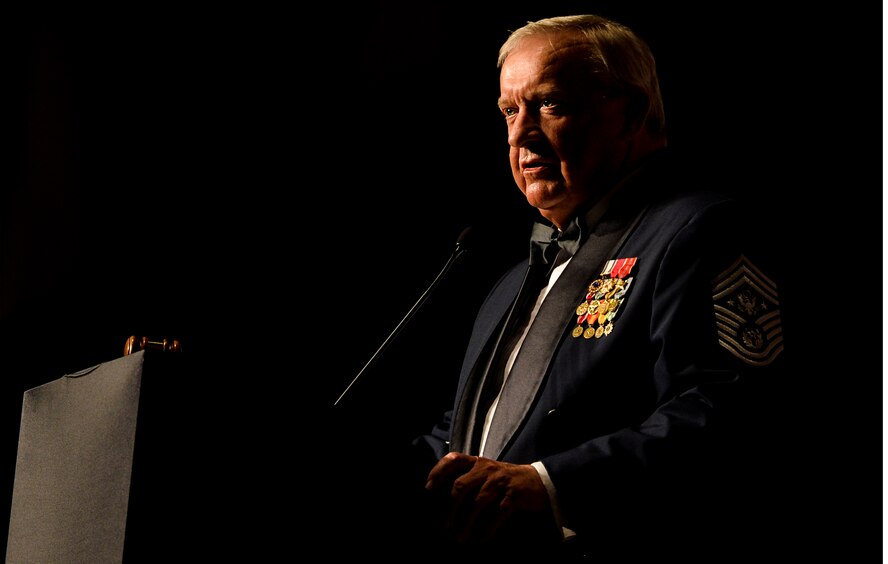 Chief Master Sgt. of the Air Force #9 Jim Binnicker, speaks during an Order of the Sword ceremony at the Emerald Coast Convention Center in Fort Walton Beach, Fla., May 9, 2014. Lt. Gen. Eric Fiel, Air Force Special Operation Command commander, was the ninth officer inducted into AFSOC’s Order of the Sword. (U.S. Air Force photo/Senior Airman Christopher Callaway)