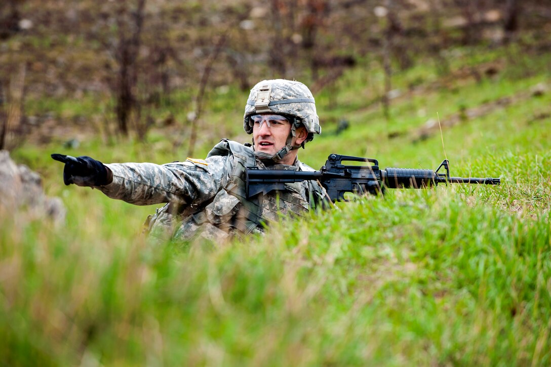 Army Sgt. Andrew Sireno provides security during the offensive maneuver ...