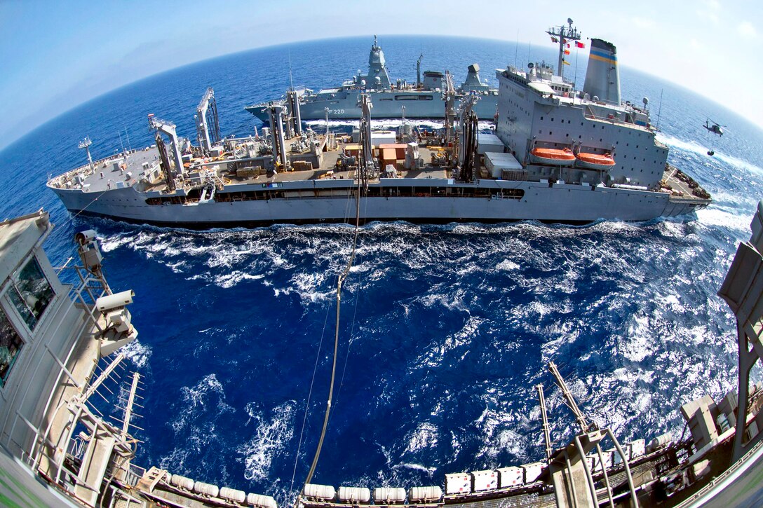 The aircraft carrier USS Dwight D. Eisenhower and German frigate FGS Hamburg conduct a replenishment in the Mediterranean Sea, June 15, 2013. The Hamburg, deployed with the Dwight D. Eisenhower Carrier Strike Group, is operating in the U.S. 6th Fleet area of responsibility to support maritime security operations and theater security cooperation efforts. 
