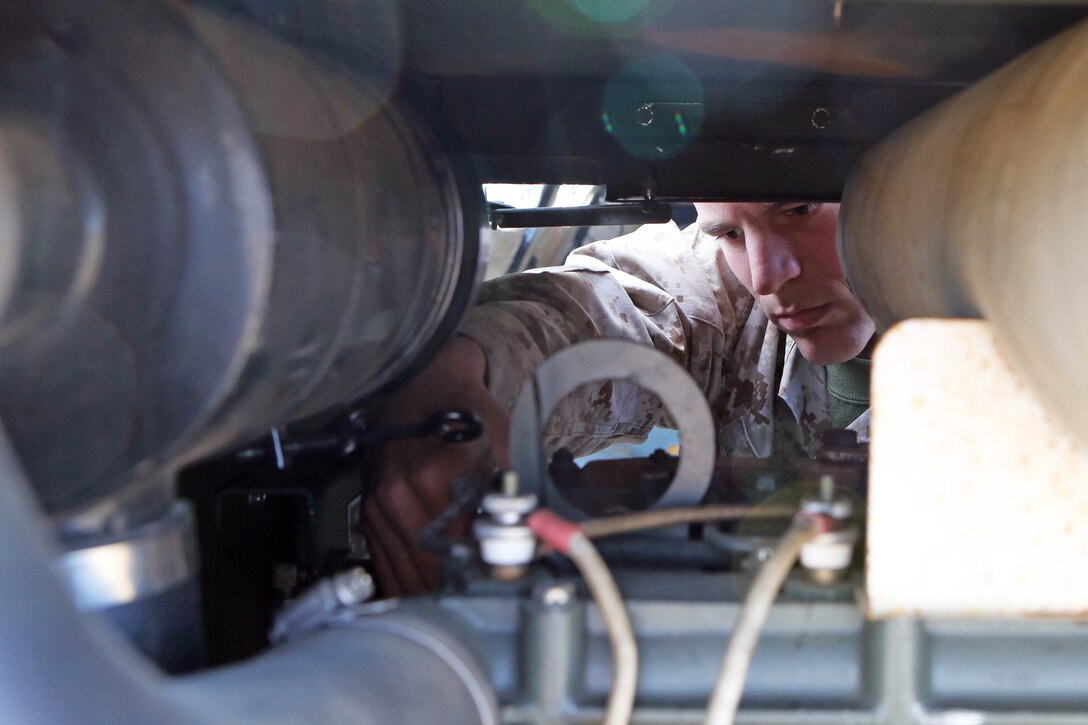 Sergeant Andrew Heins, a 22-year-old maintenance mechanic, Maintenance Detachment, Combat Logistics Battalion 15, 1st Marine Logistics Group repairs a generator during the battalion's first field training exercise of the year at Red Beach 
aboard Camp Pendleton, Calif., May 6-10, in preparation for pre-deployment training with the 15th Marine Expeditionary Unit this fall. The exercise allowed CLB-15 to practice procedures and protocols they will apply while acting the 15th MEU's primary logistical support element during its deployment early next year. Providing this support to the MEU allows it to focus on its chief objective as a crisis response force, ready to respond to disaster or humanitarian relief operations.
