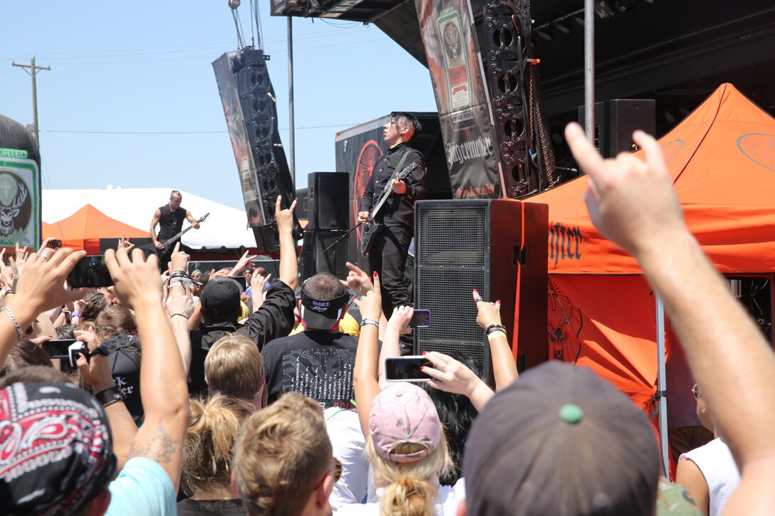 Members of the band Gemini Syndrome perform for audience members during the Monster Energy's Carolina Rebellion May 4 in Concord, N.C. More than 20 Marines and Sailors from Marine Corps Air Station Cherry Point, N.C. with the Single Marine Program built camaraderie May 2-4 during the annual Monster Energy's Carolina Rebellion trip to Charlotte, N.C. 